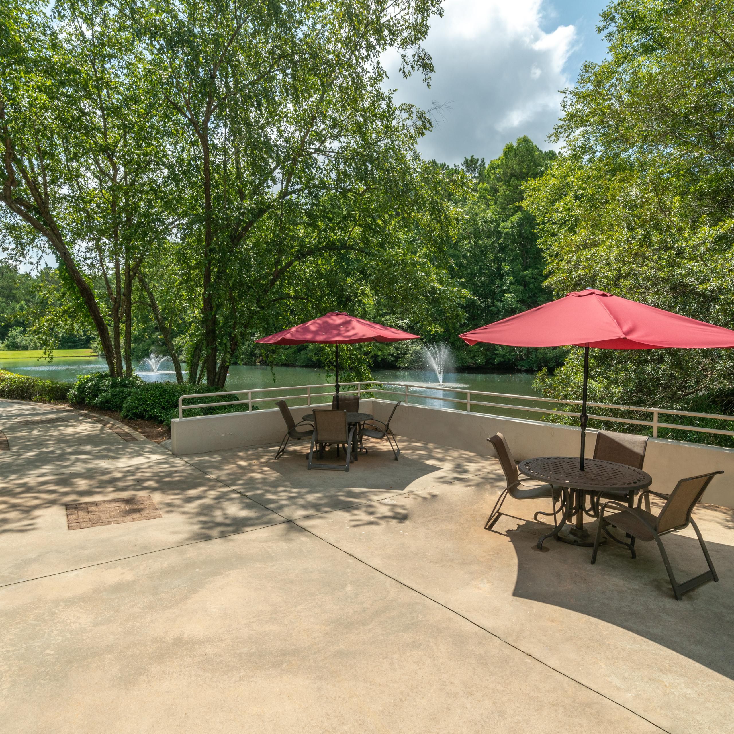 Relax on this Guest Patio and enjoy the view of our scenic lake.