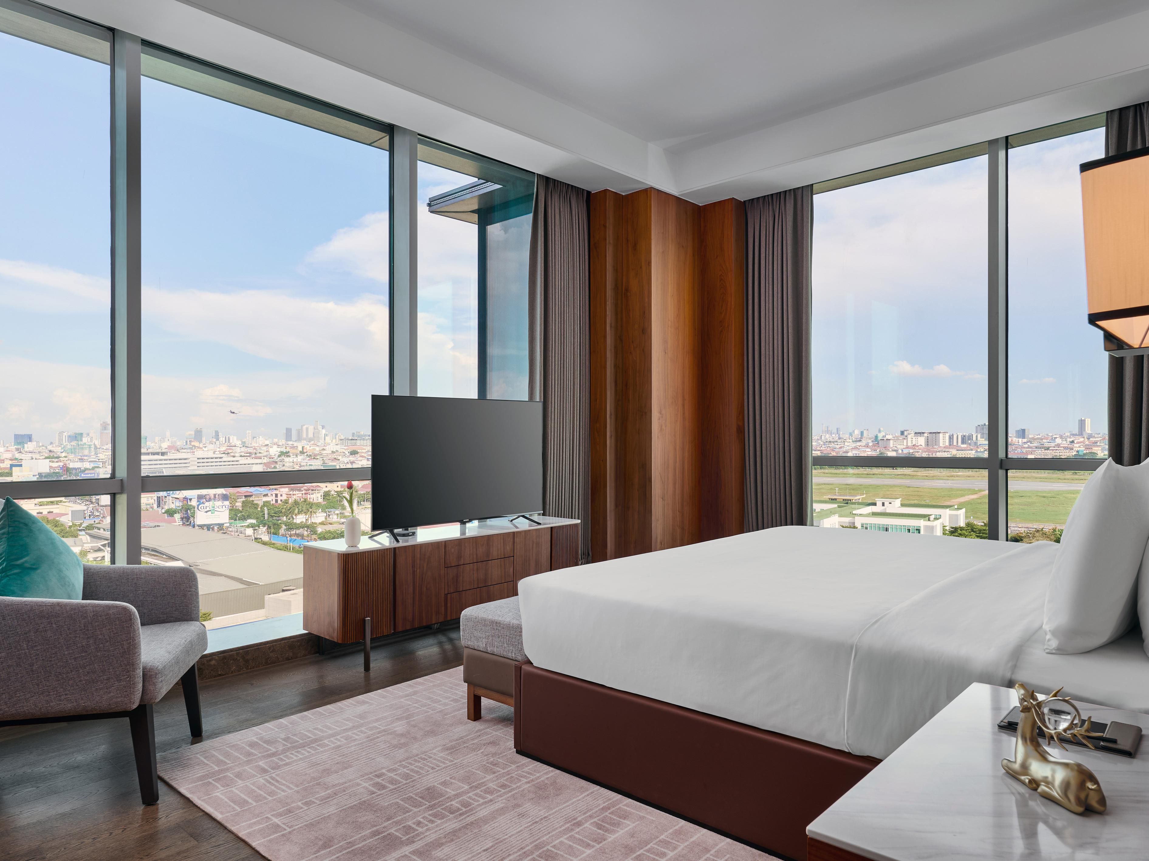 Step into a guest room designed for comfort and convenience, where expansive space meets cutting-edge technology. Lights automatically illuminate your path at night, while curtains glide open with a touch, creating a seamless, effortless experience. Every detail is crafted to make your stay intuitive, relaxing, and remarkably modern.