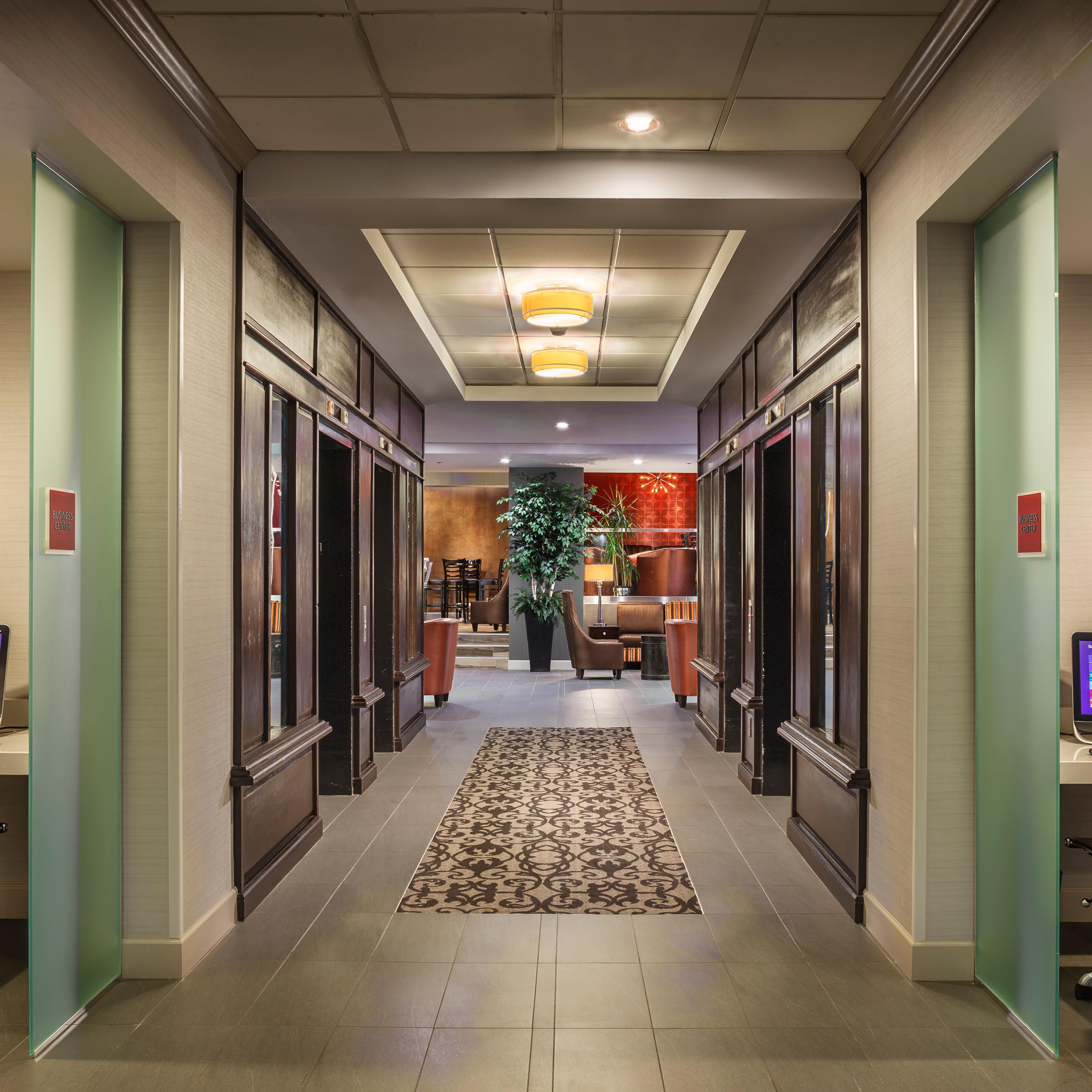 Free Business Centers Flank the Elevator Lobby