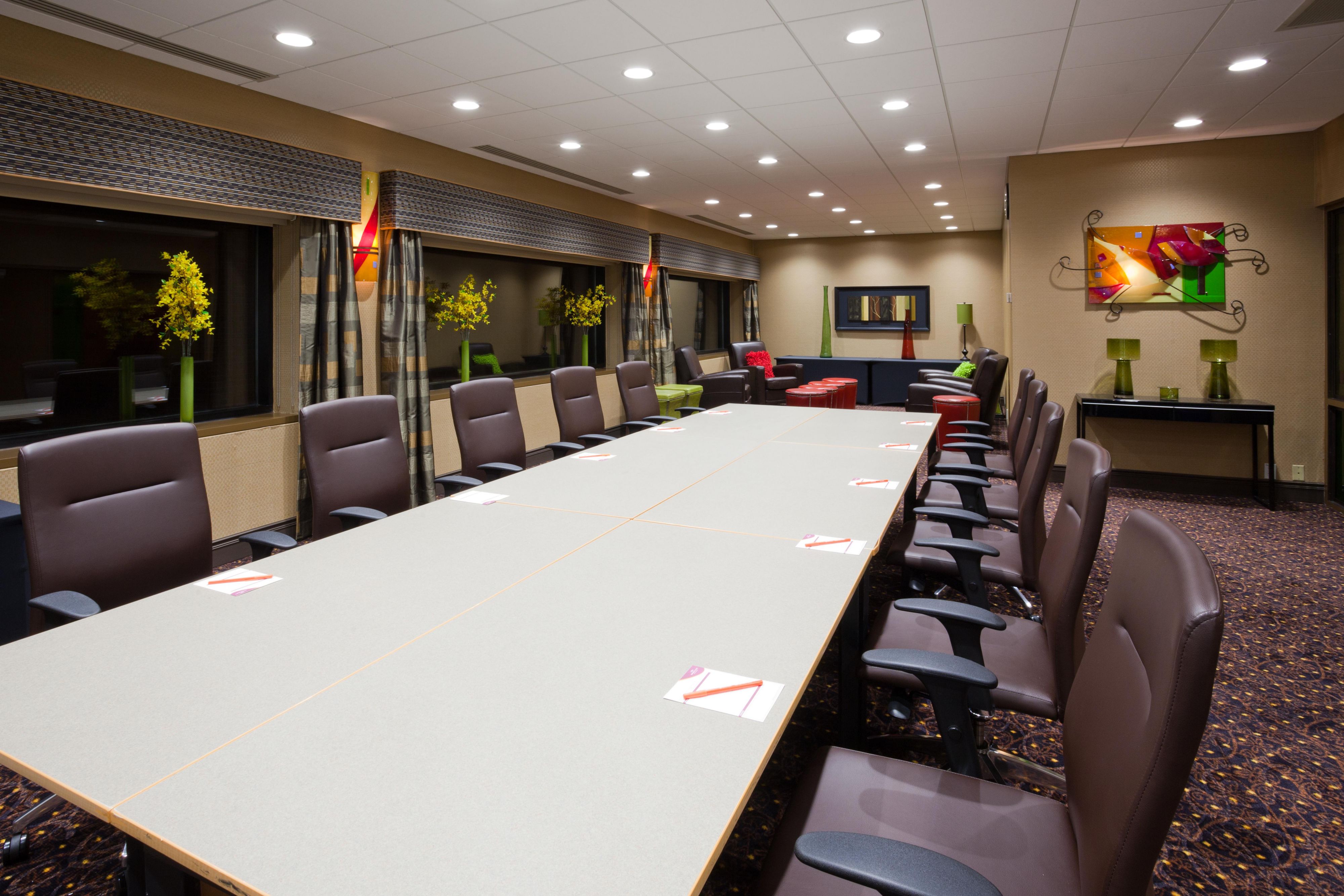 Studio 16 meeting room with long board room table