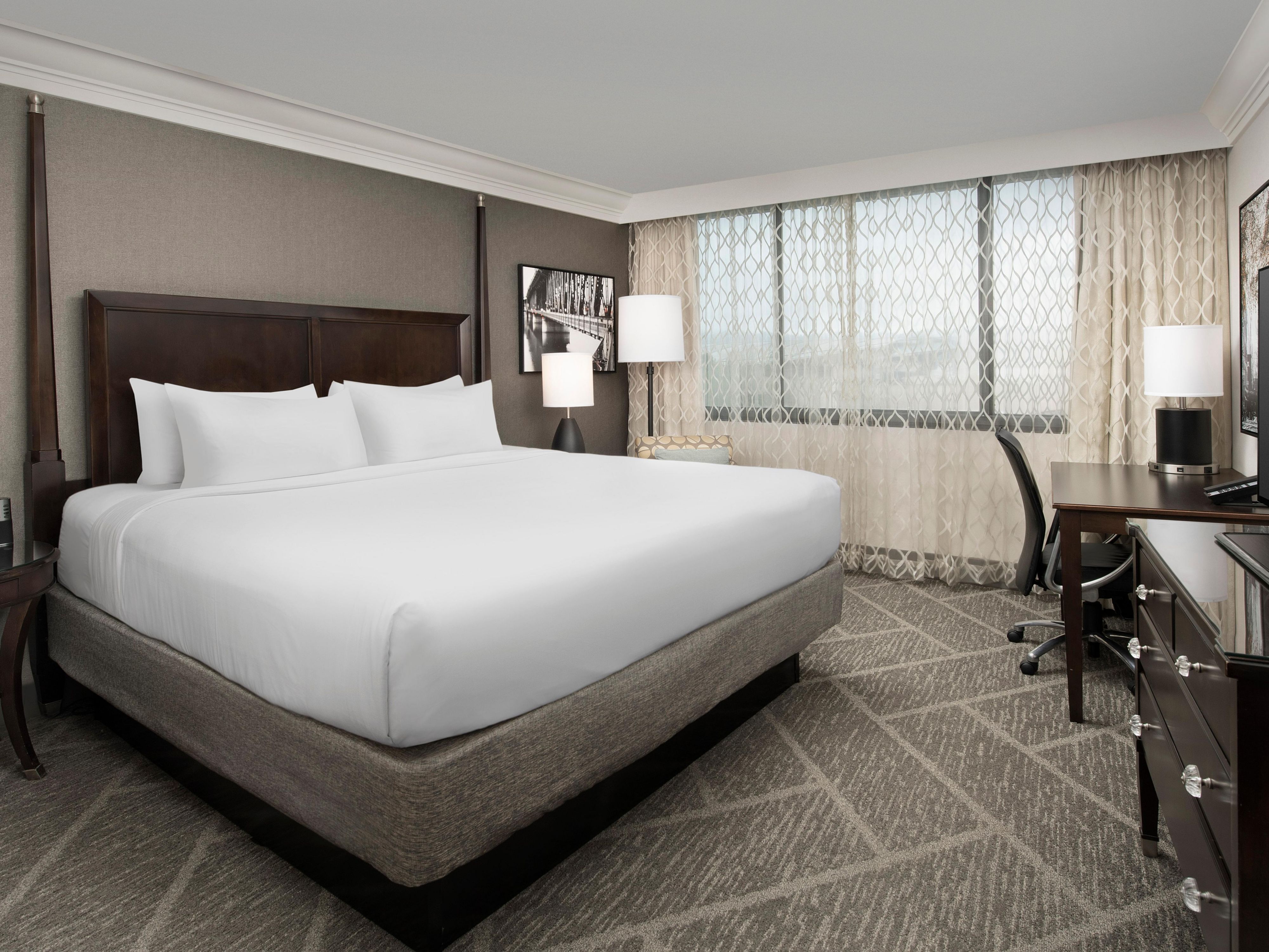 Our rooms are designed to be a restful respite after a long day. You'll enjoy complimentary Wi-Fi, premium bedding, aromatherapy kits, and dedicated Quiet Zone rooms. You can even indulge in upscale dining from the comfort of your room with our freshly-prepared room service offerings.
