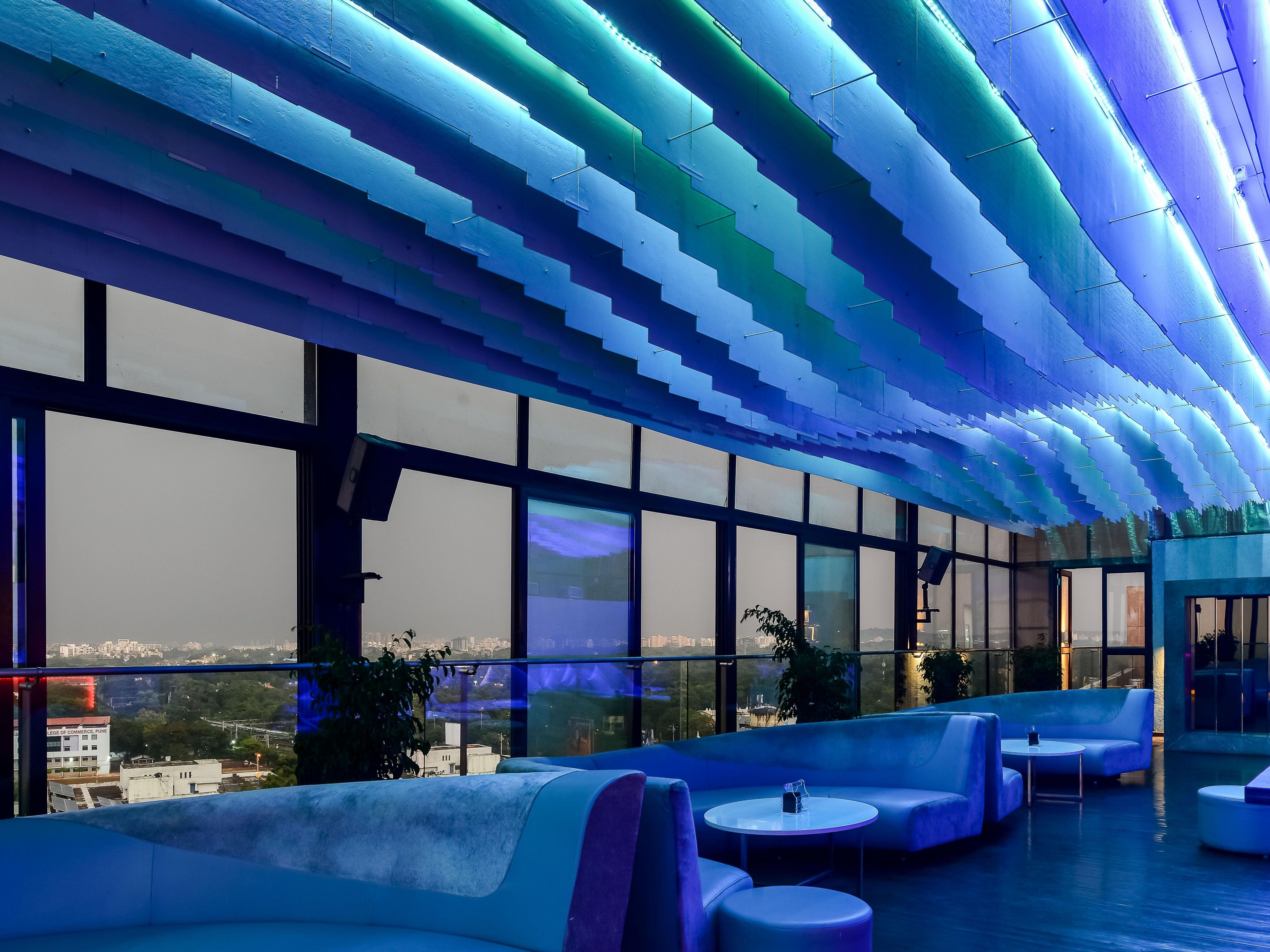 Experience Pune's nightlife at Evviva The Sky Lounge. Enjoy a panoramic view of the city with sizzling bites and refreshing signature sips.