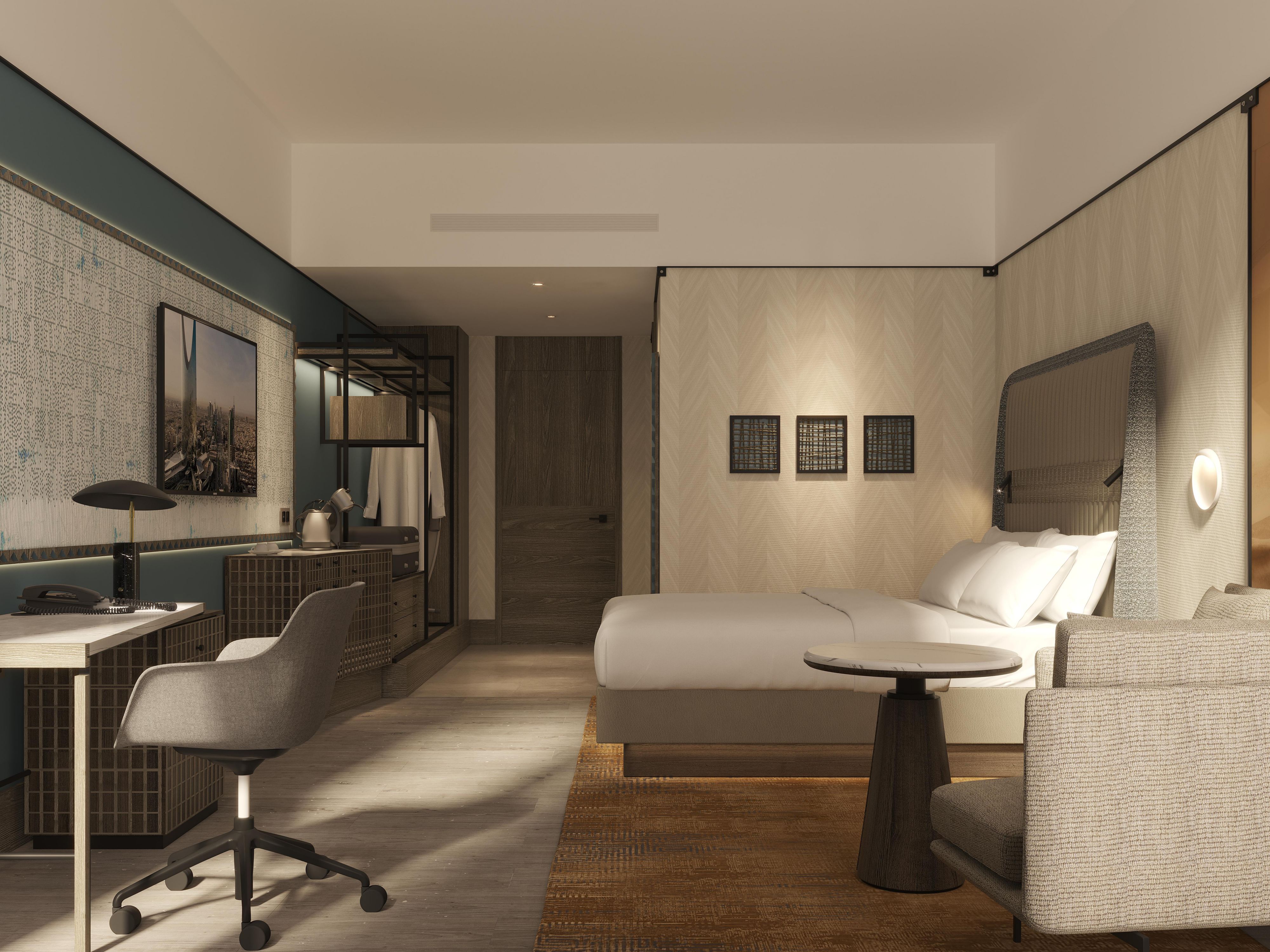 Blending comfort and connectivity, our 192 rooms and 110 residential suites feature modern interiors, skyline views, and thoughtful amenities. Suites include fully equipped kitchens and spacious living areas — perfect for business or extended stays.