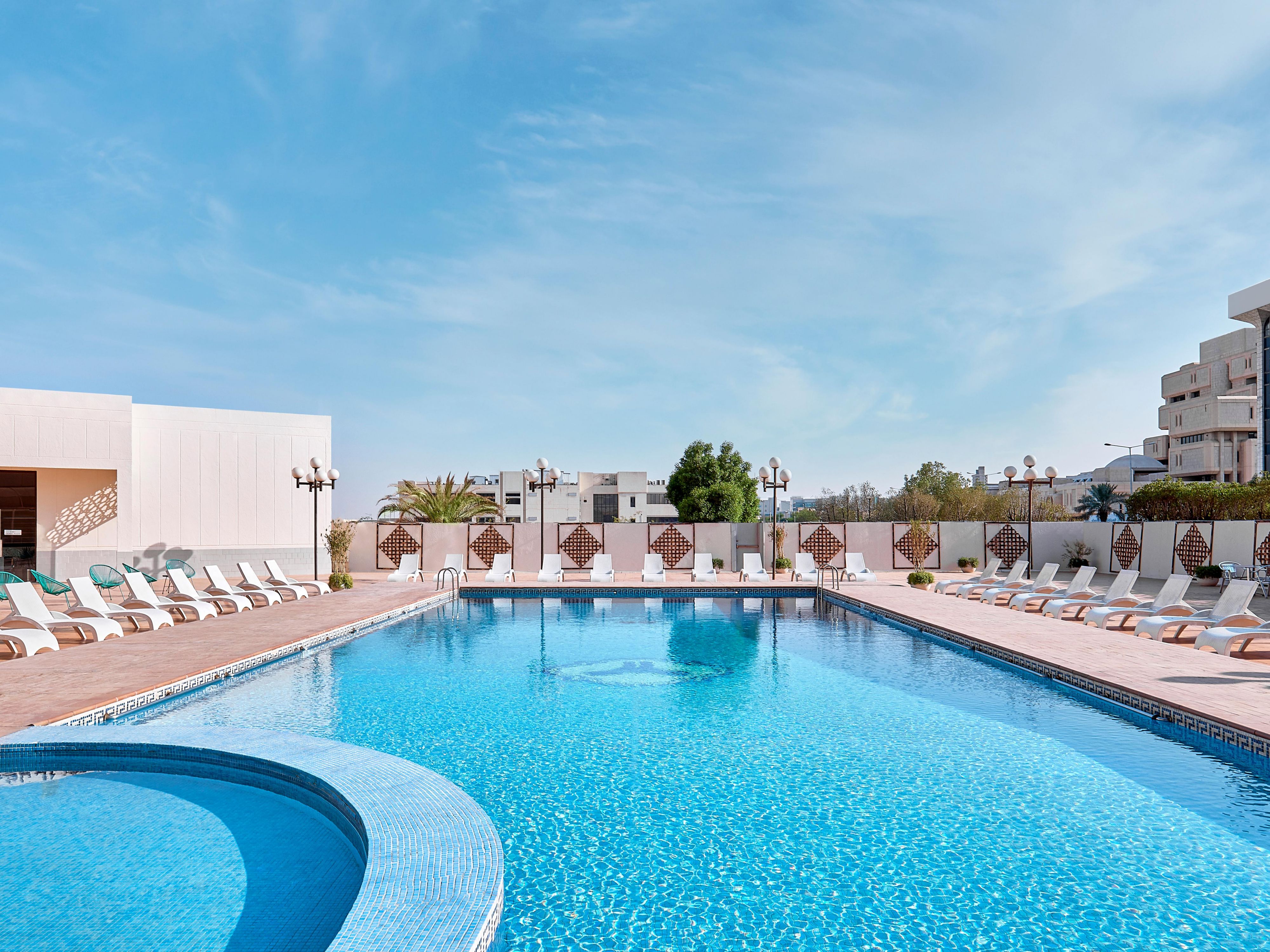 Escape to a serene oasis and enjoy the refreshing outdoor pool.  Whether you are looking to swim, sunbathe or simply relax by the water, our pool area offers the perfect setting for leisure and enjoyment.  The meticulously out door pool boasts crystal clear waters, providing a retreat from the hustle and bustle.