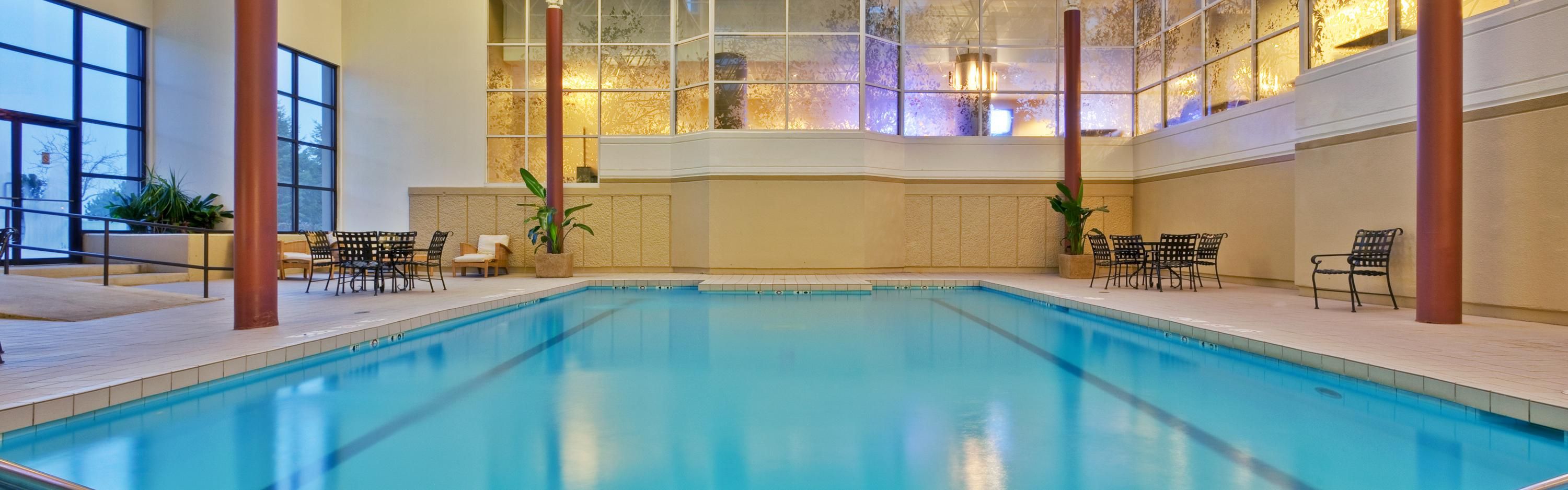 Indoor swimming pool with outdoor patio