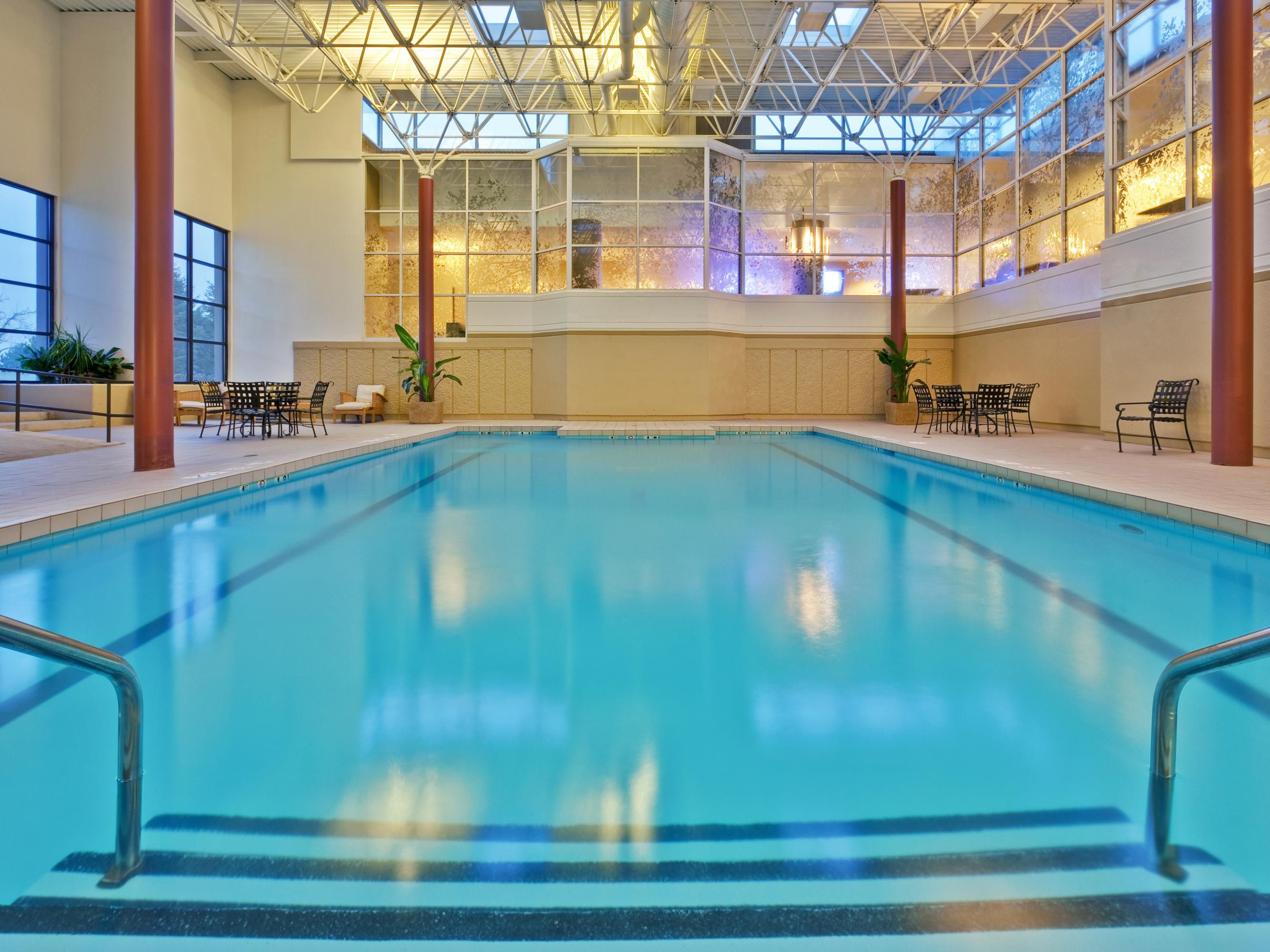 Indoor swimming pool with outdoor patio