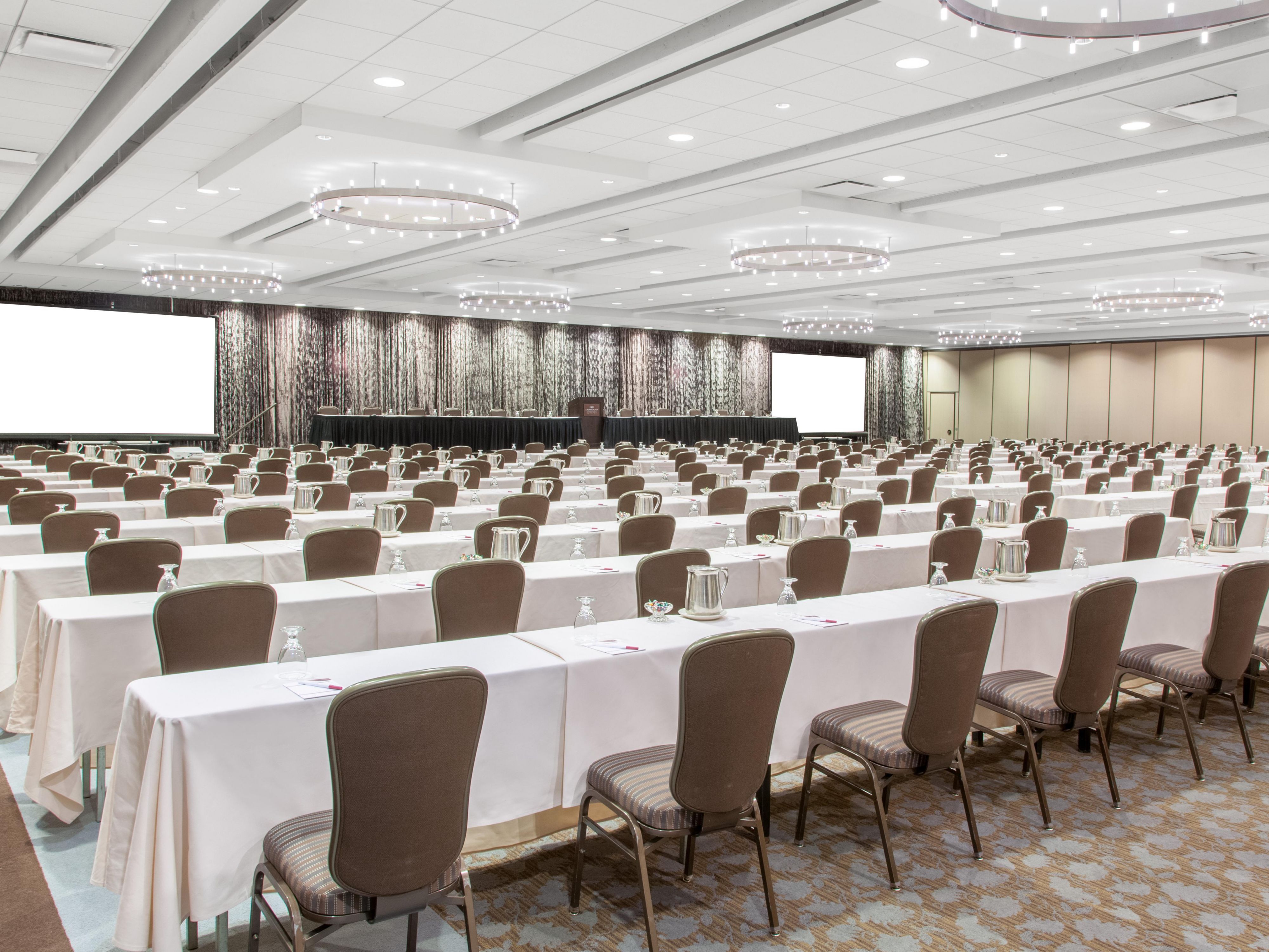With 55,000 sq ft spread across 27 meeting rooms on two floors and a tiered amphitheater, our versatile venue is designed to accommodate events of all sizes. From intimate gatherings to government conferences, corporate meeting, and dream weddings, we have the perfect space for you.