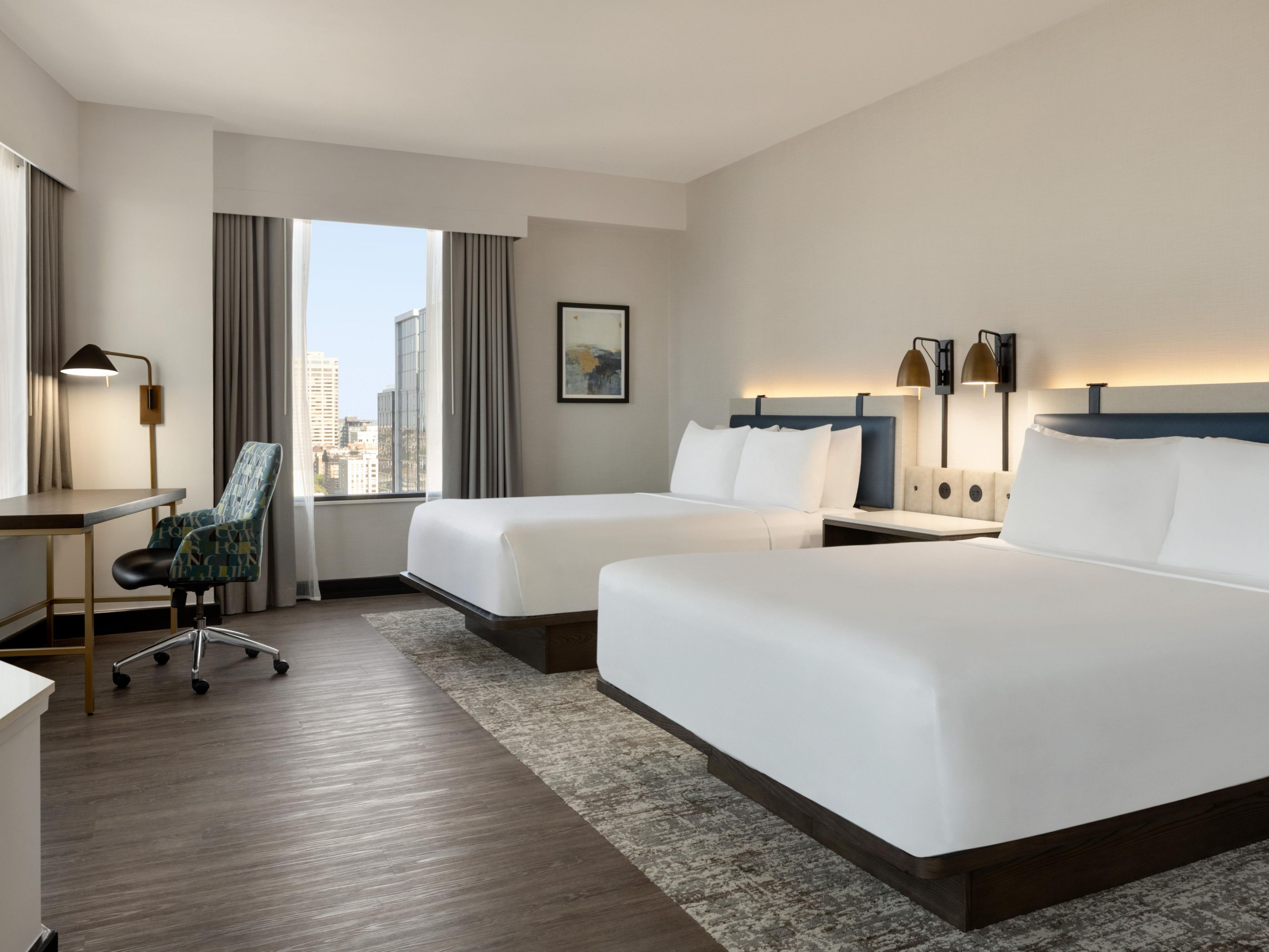 Our accessible 2 queen bedroom is brightly lit and well-appointed