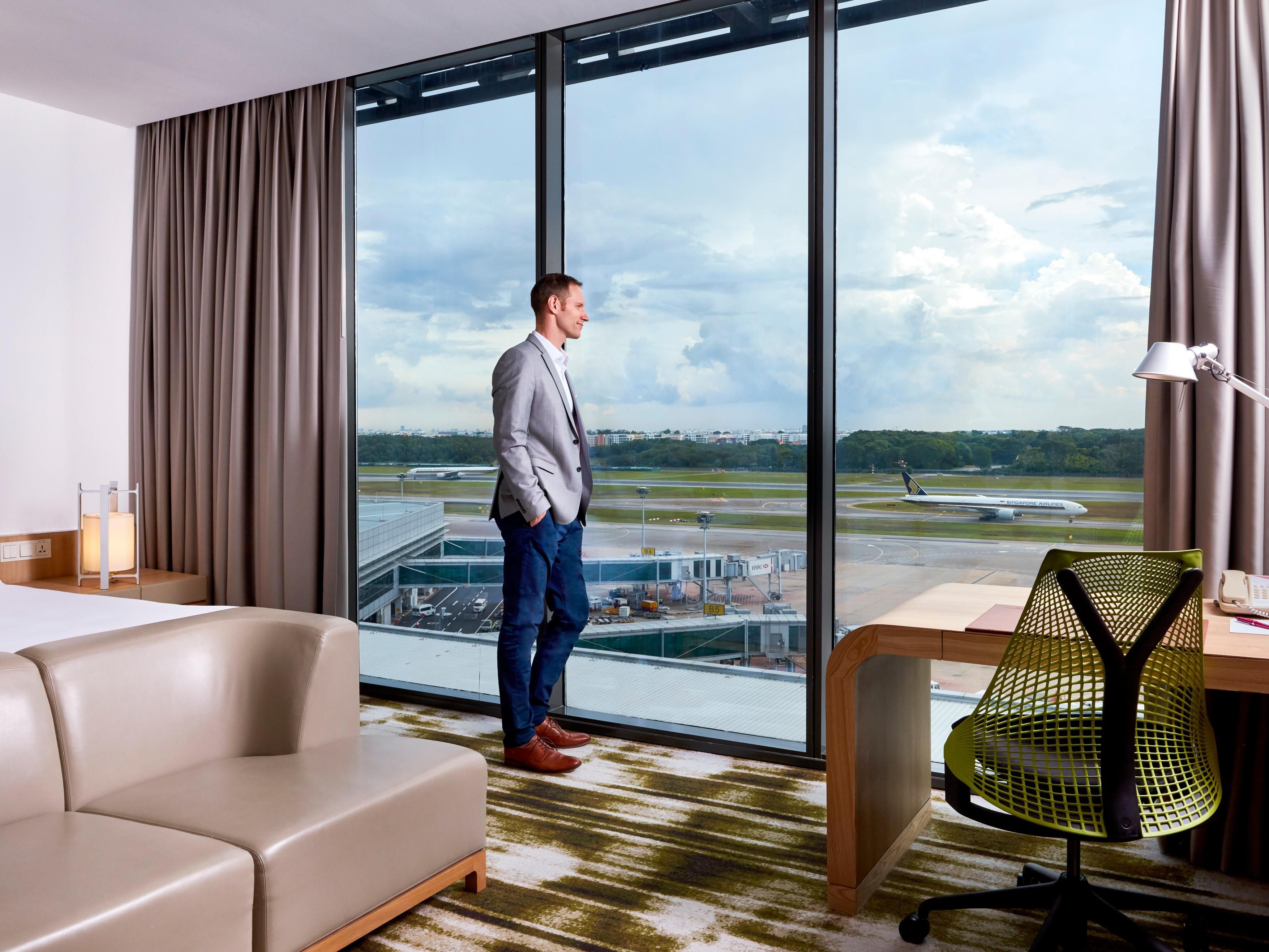 Enjoy spectacular views of the runway from our Premier Rooms with Runway View. The rooms provide a relaxing respite for travellers, with luxurious bedding and spacious bathrooms with soaking tubs and walk-in rainfall showers and complimentary Wi-Fi.