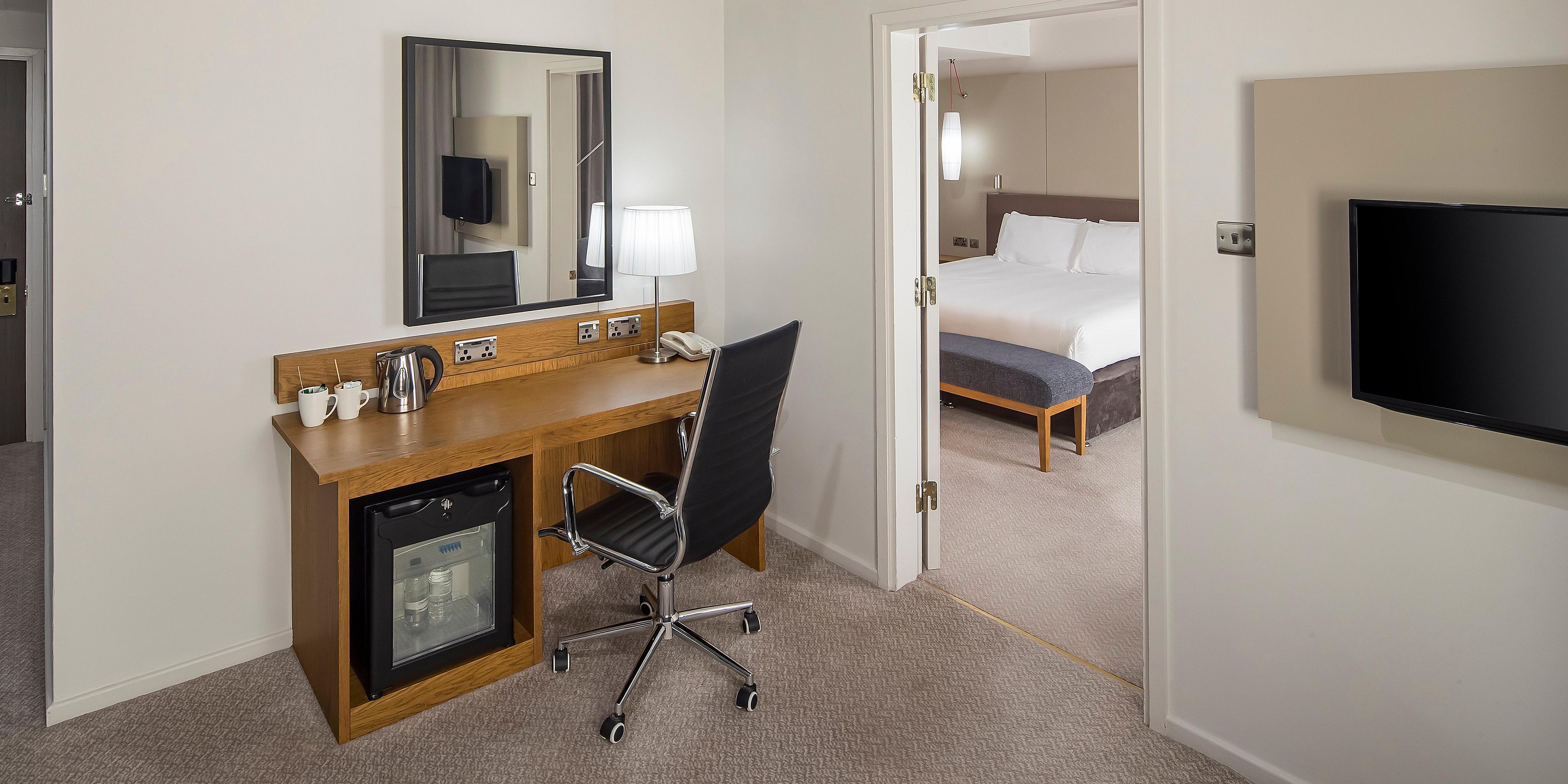 our spacious suites feature a spacious adjoining living room.
