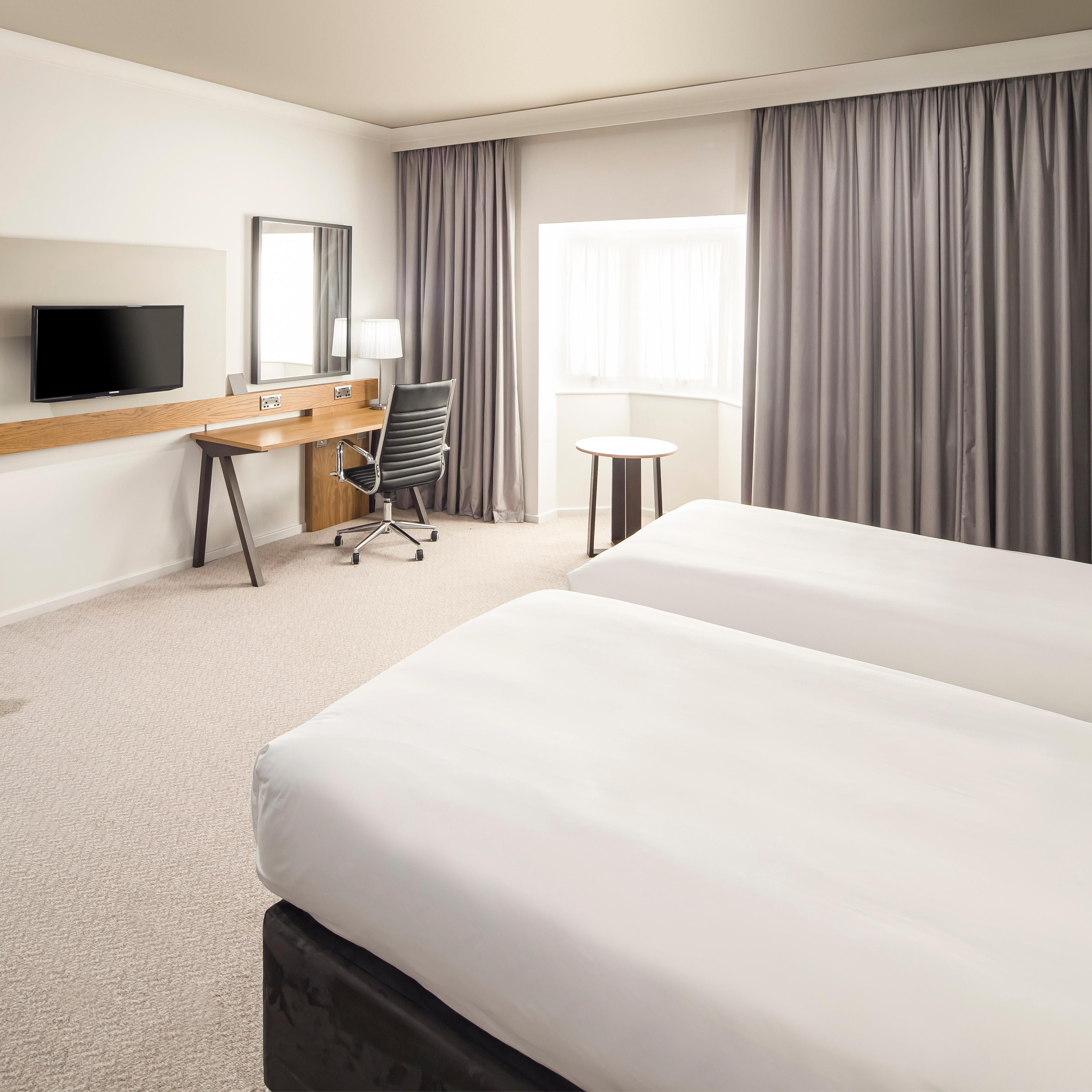 Enjoy your stay in our relaxing and modern twin bedroom.
