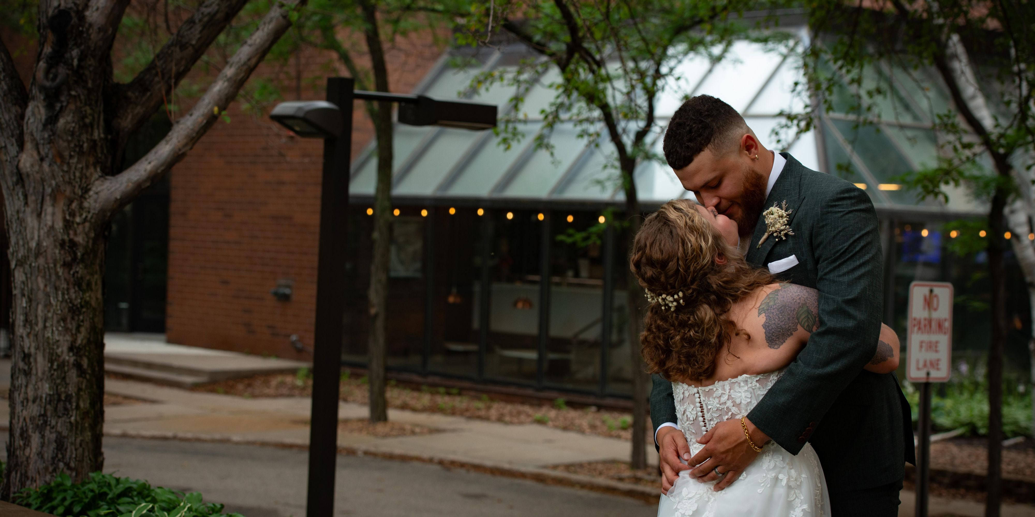 Bride and groom kissing