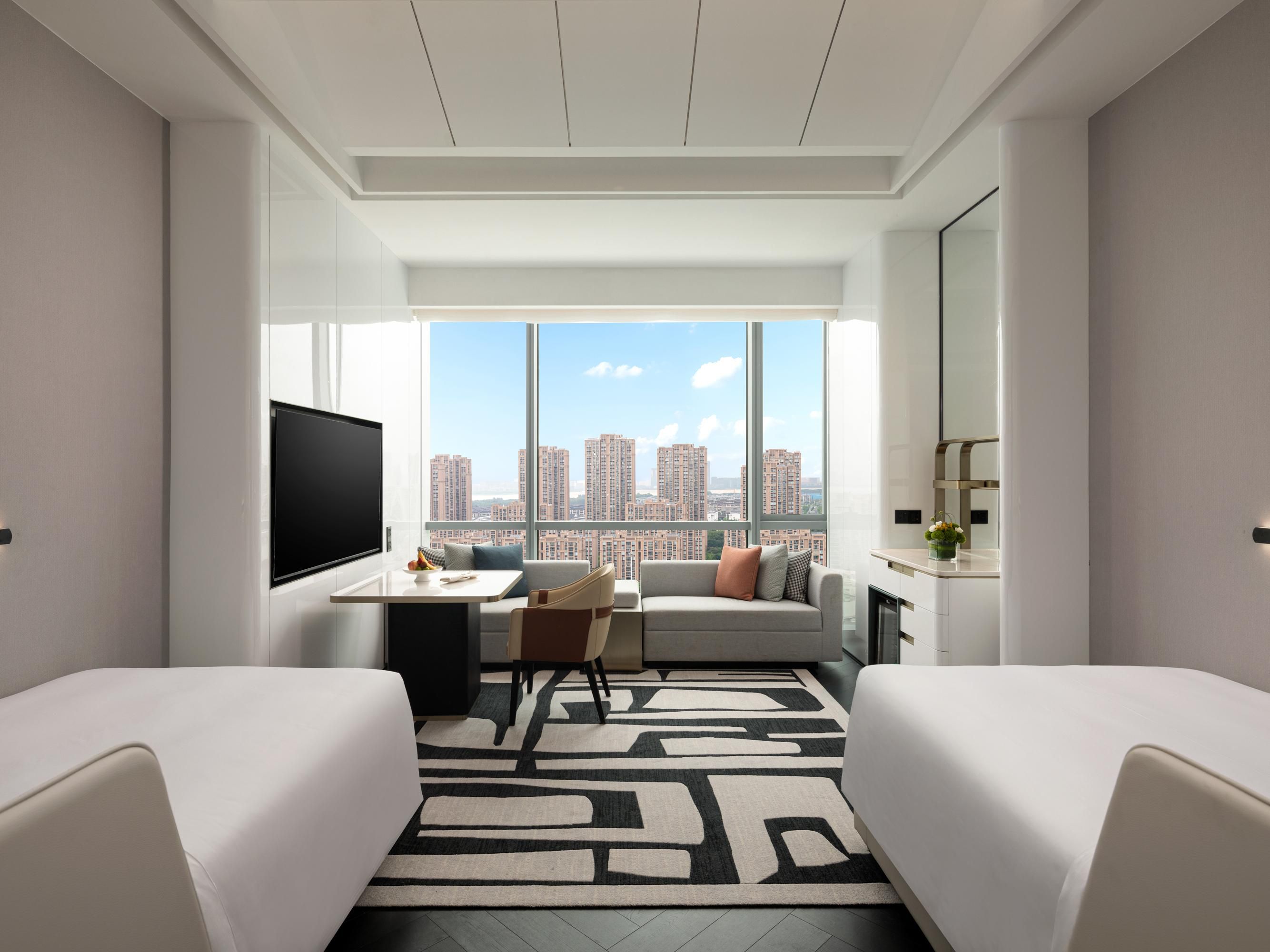 Each room's open space is thoughtfully divided into sleeping, working & leisure areas & is equipped with smart room functions. All rooms are equipped with high-quality amenities, including fully automatic double-layer blackout curtains to ensure restful sleep. We also provide the small items needed for daily life, allowing you to "Travel Light".