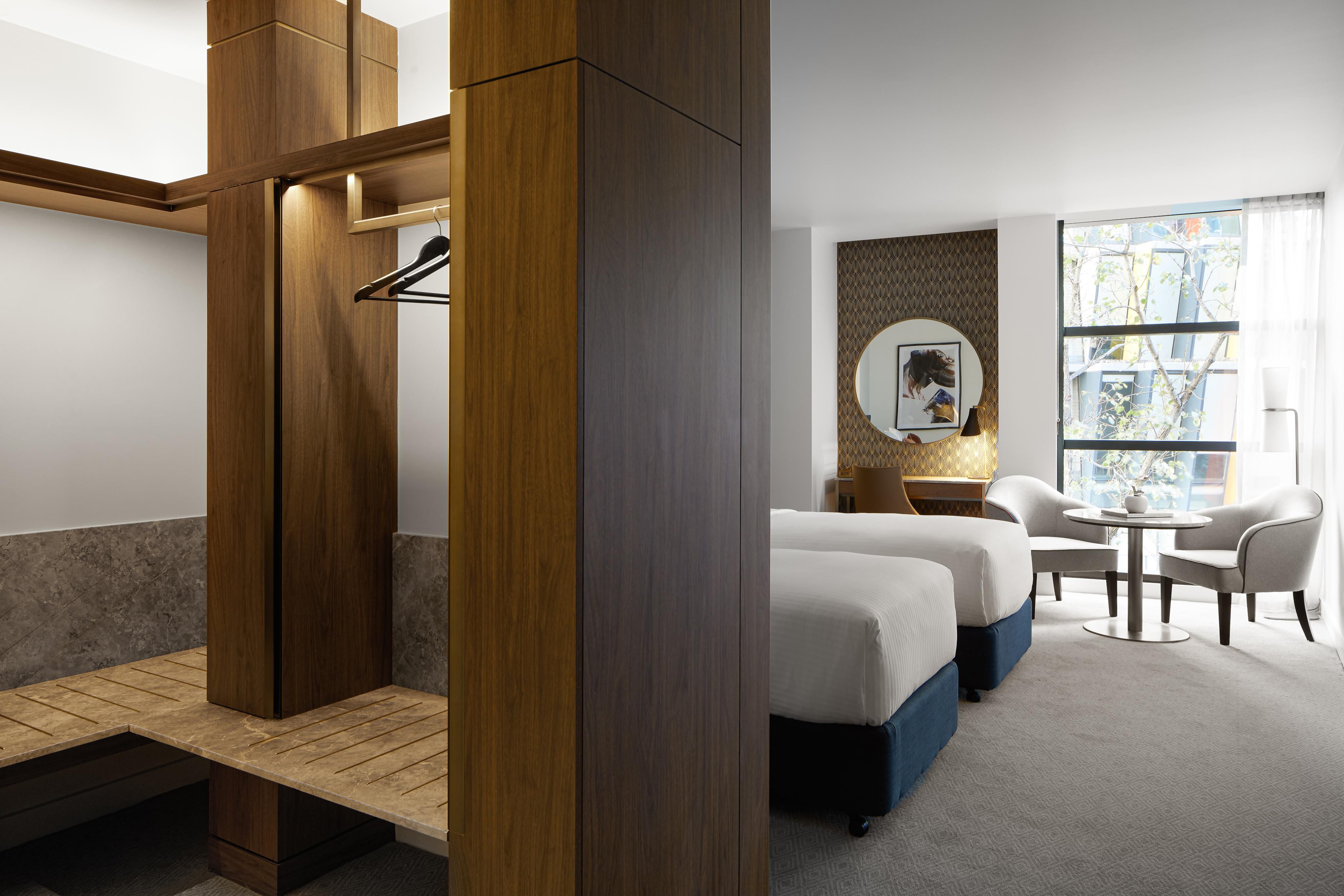 Premium rooms feature zones to unwind and ample wardrobe space