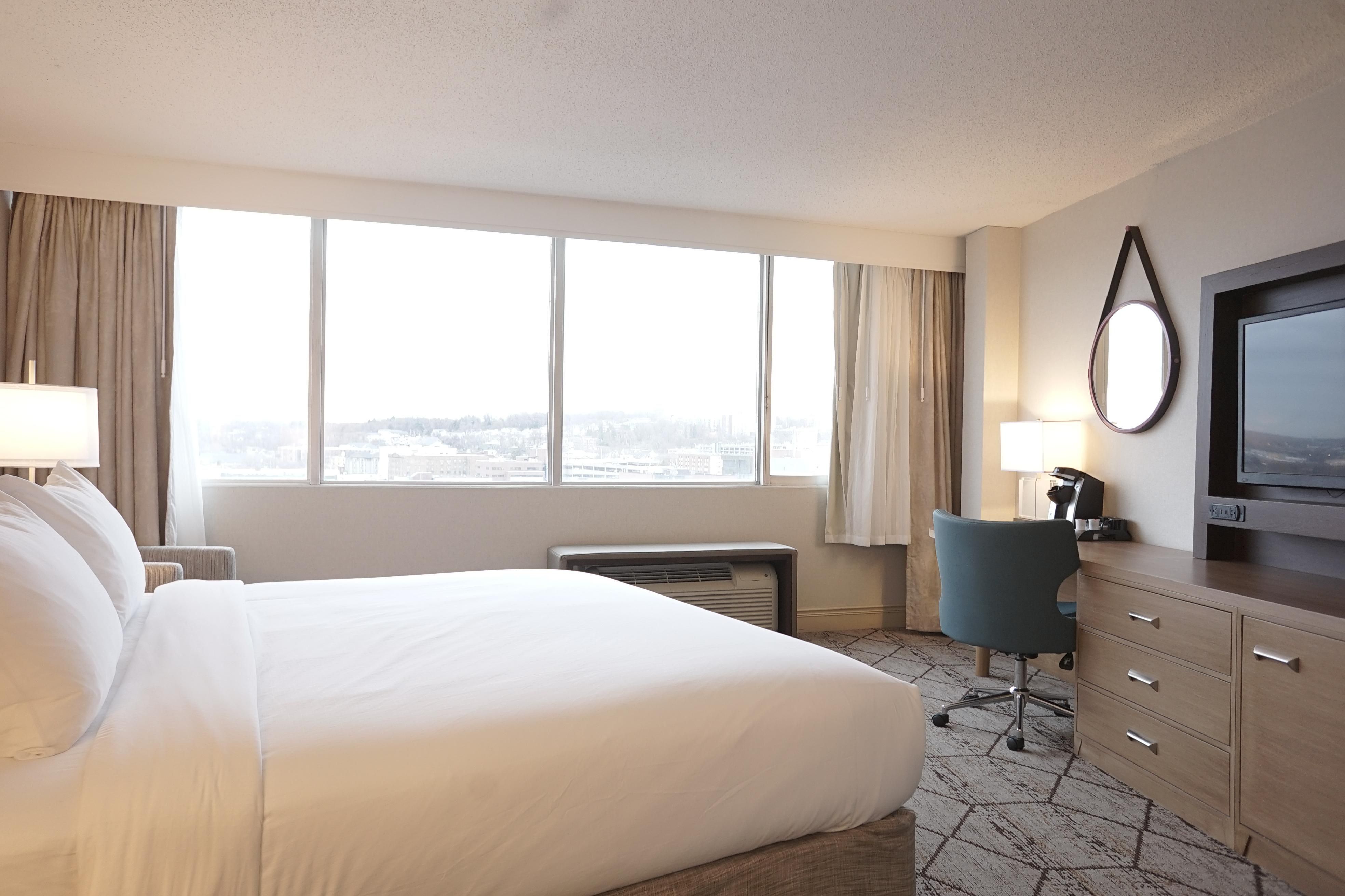 Our king bedrooms with a view of Syracuse.