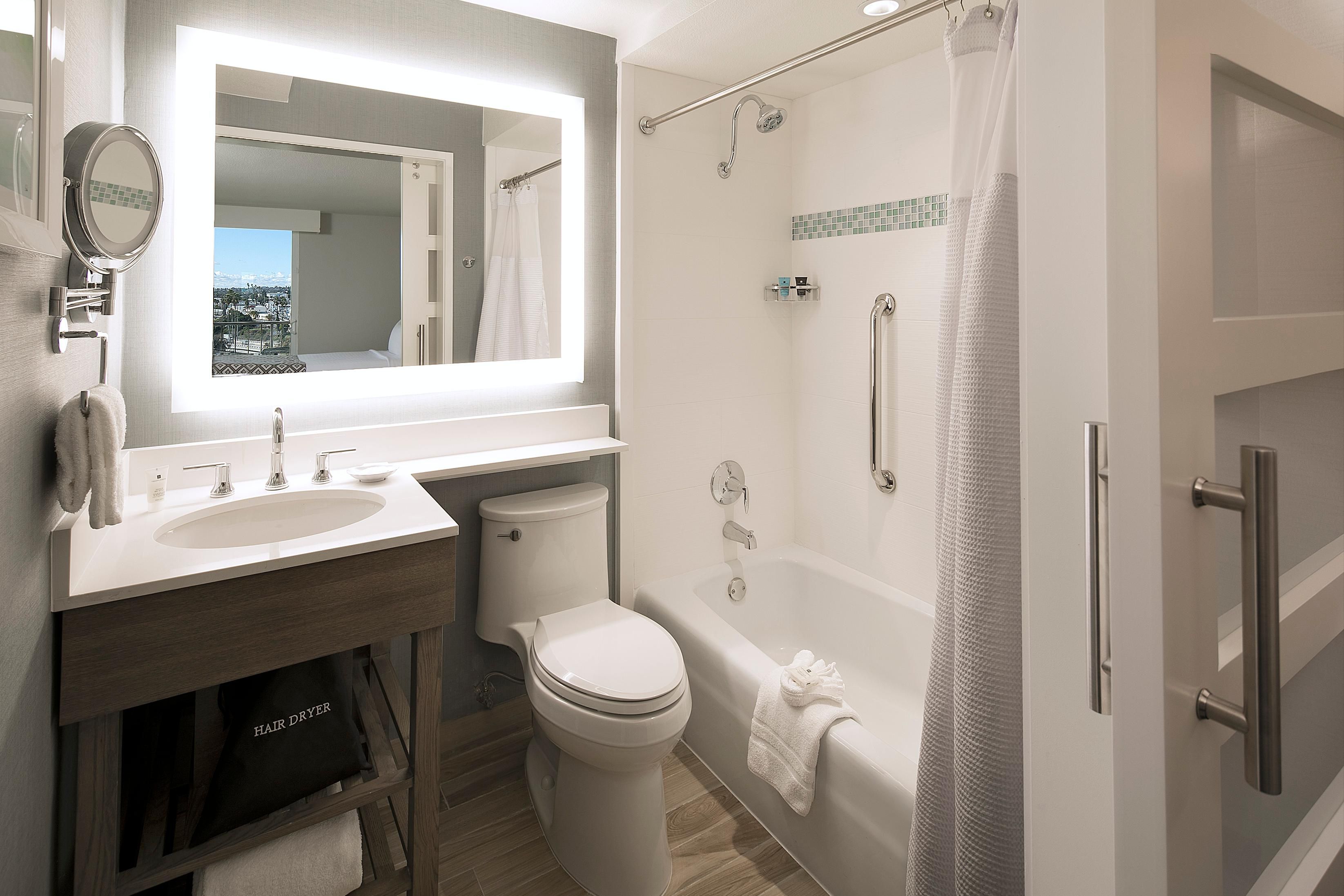 2 Queen Room Bathroom with shower and bathtub