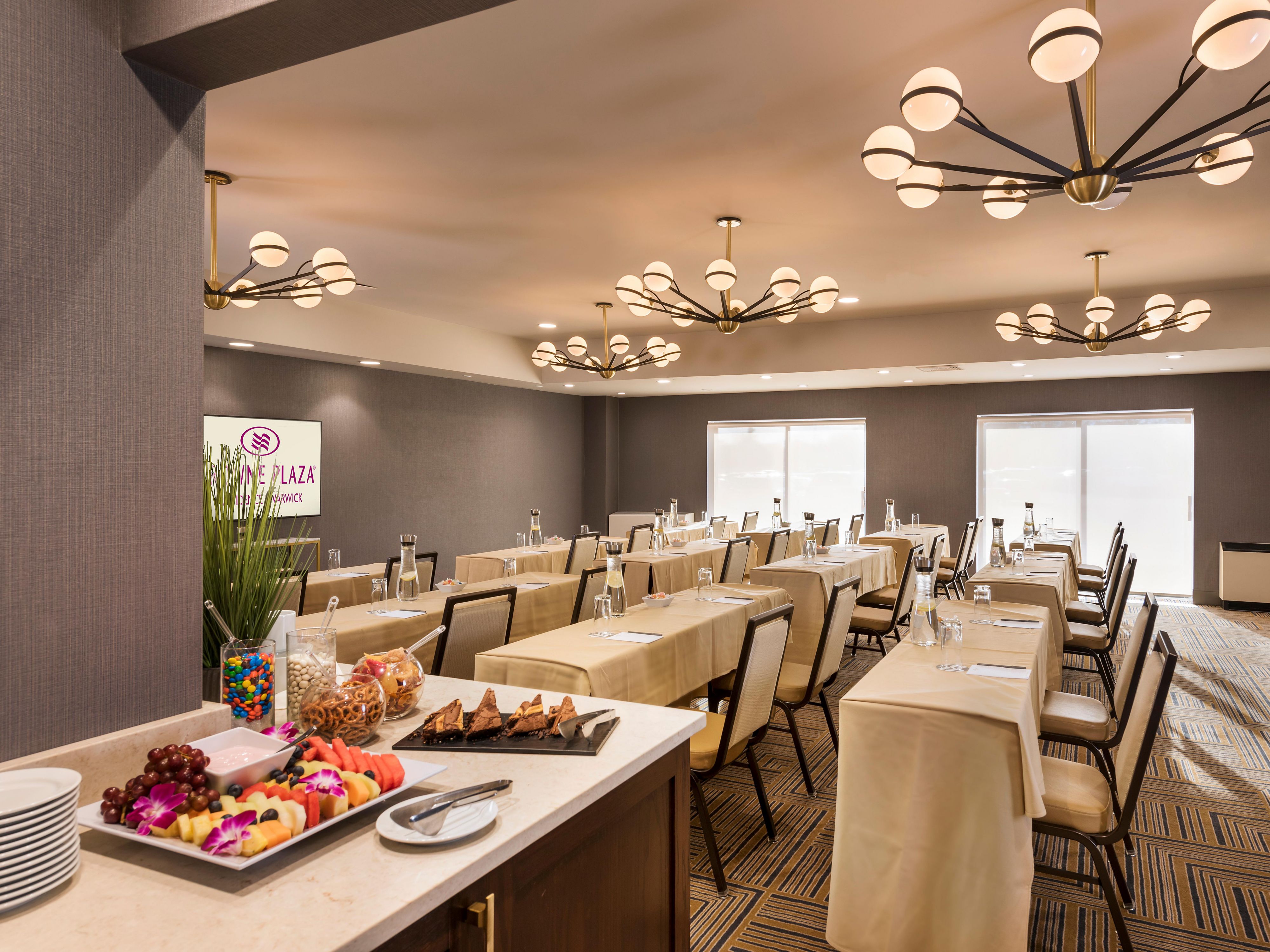 With 25 diverse function rooms totaling 45,000 square feet of meeting space, including a grand ballroom and smaller spaces, the Crowne Plaza Hotel Providence-Warwick is ideal for meetings, conferences, and weddings. Enjoy modern technology, customizable layouts, and our expert support team for seamless events.