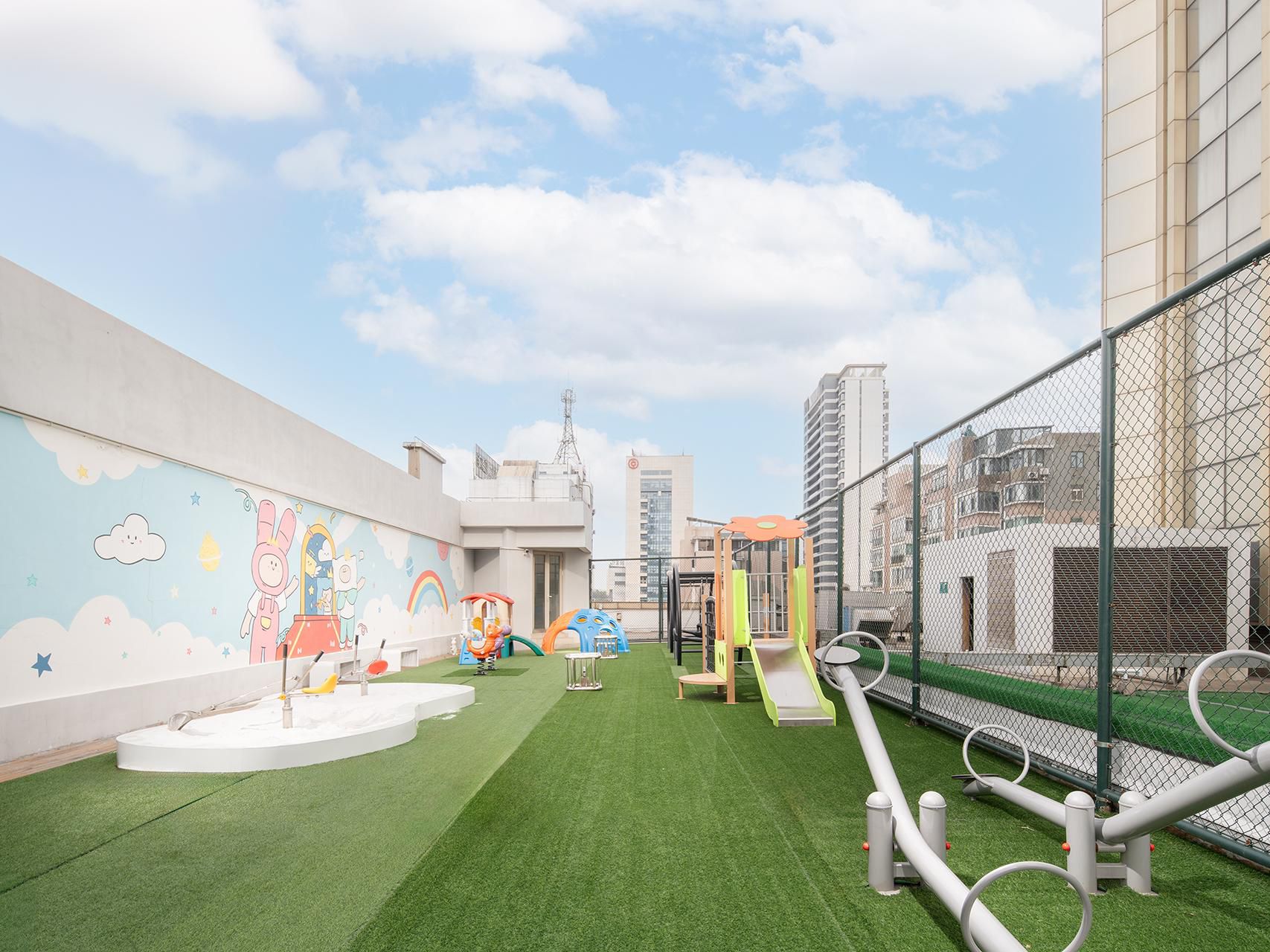 The indoor and outdoor Kid's Club is located at the fourth floor of hotel, which includes a variety of non-motorized play equipment, such as sandpits, slides and swings.