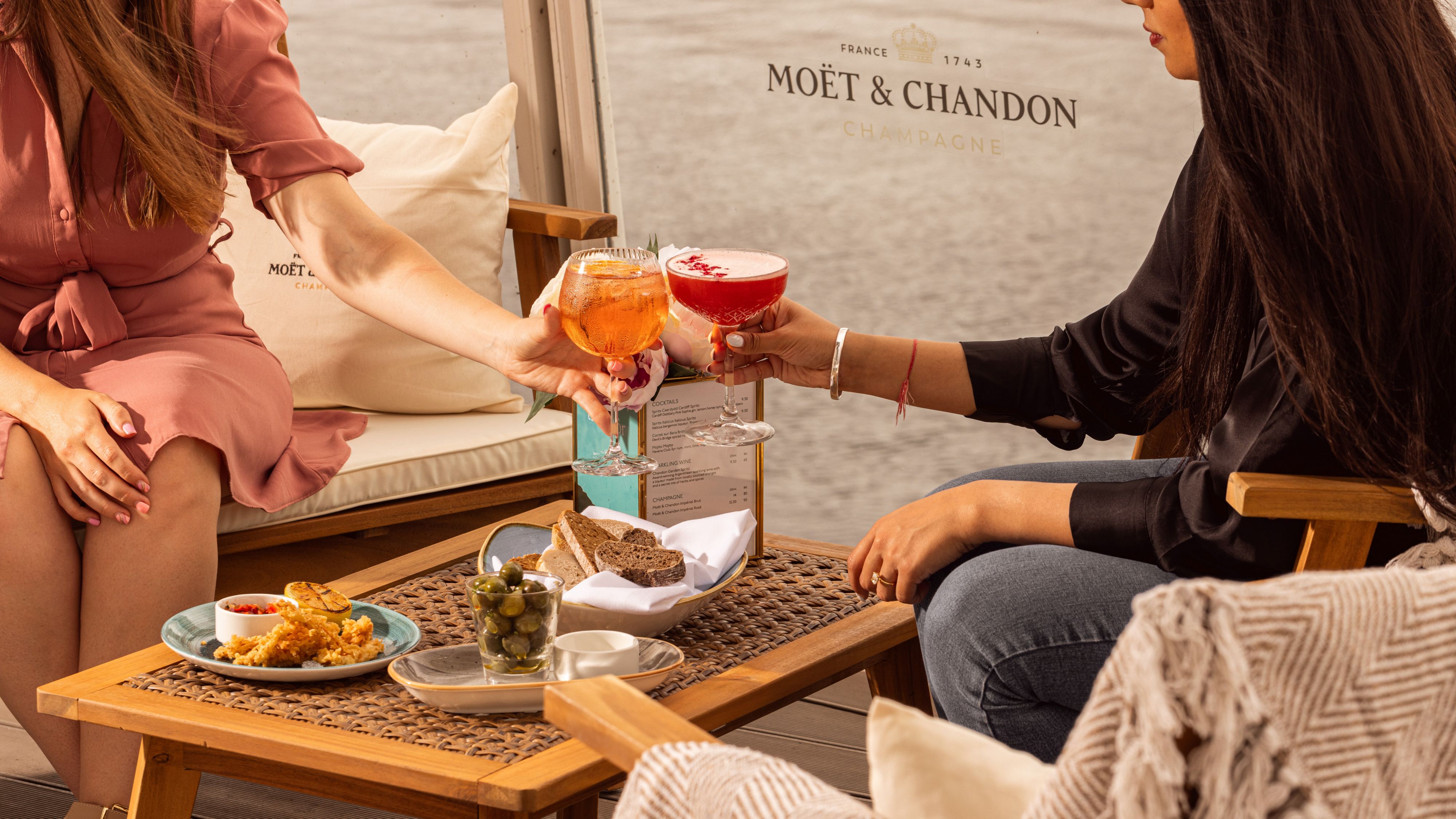 Women cheersing cocktails