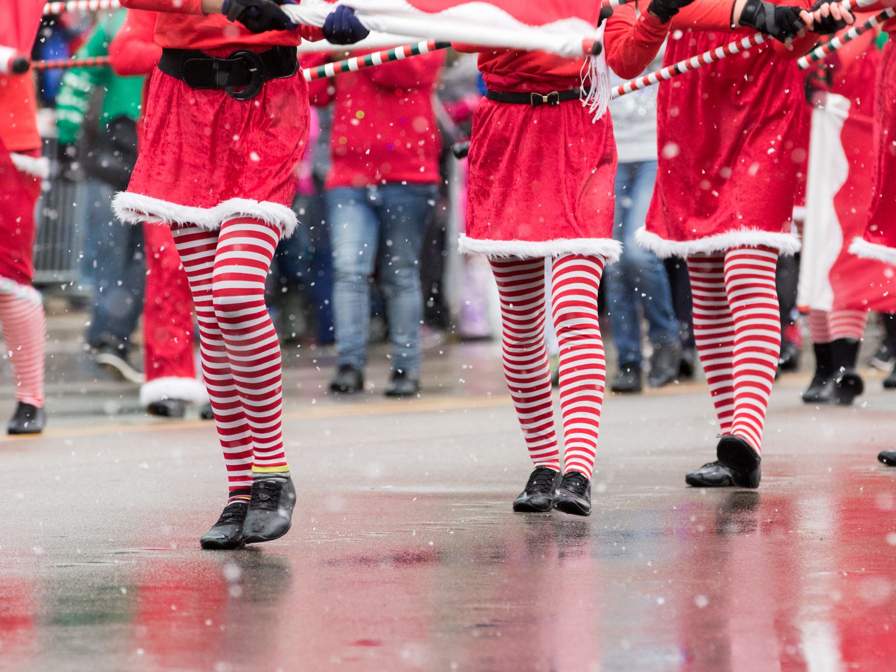 Parade participants in Christmas outfits