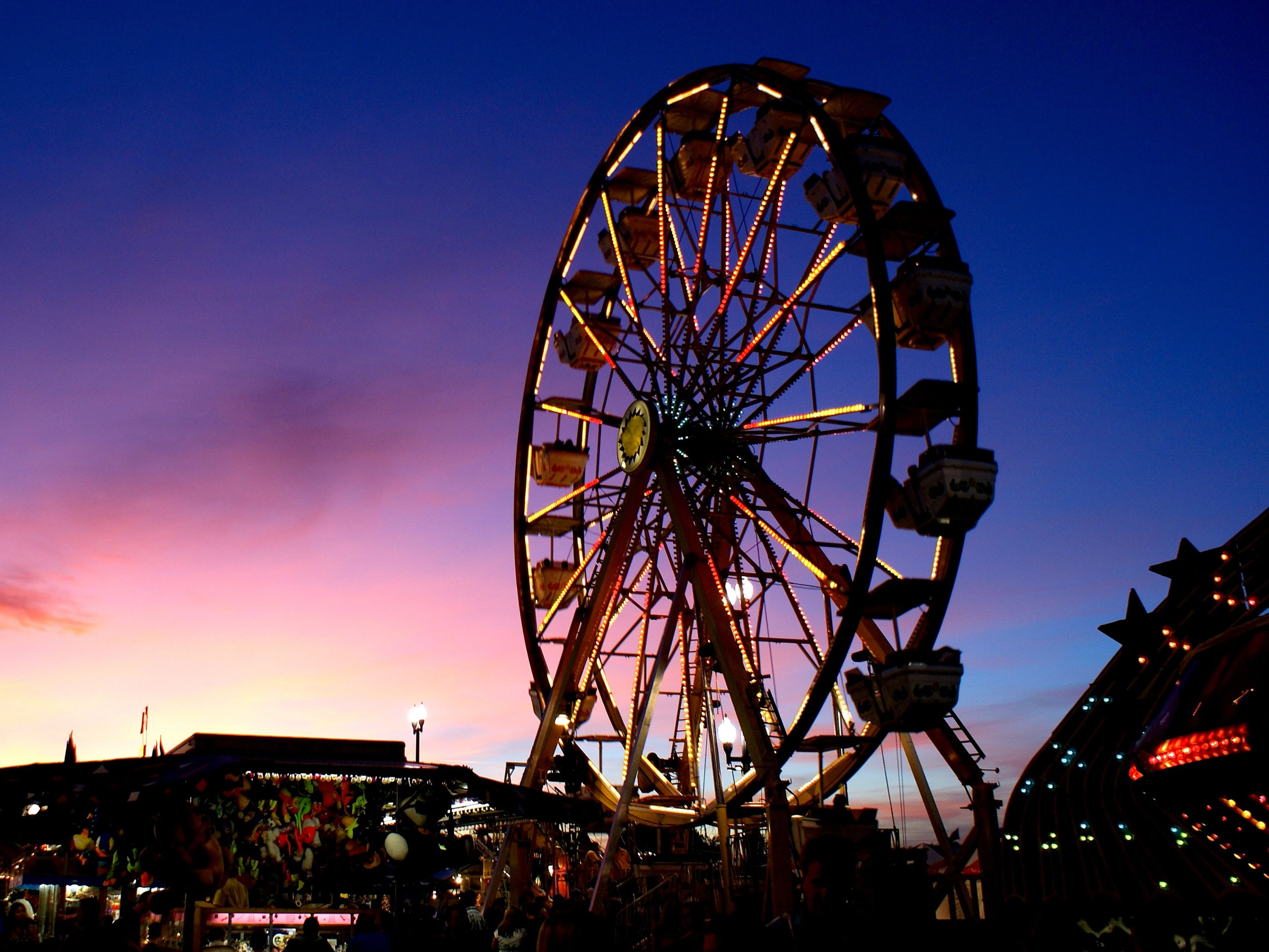 ferris wheel at the fair during sunset