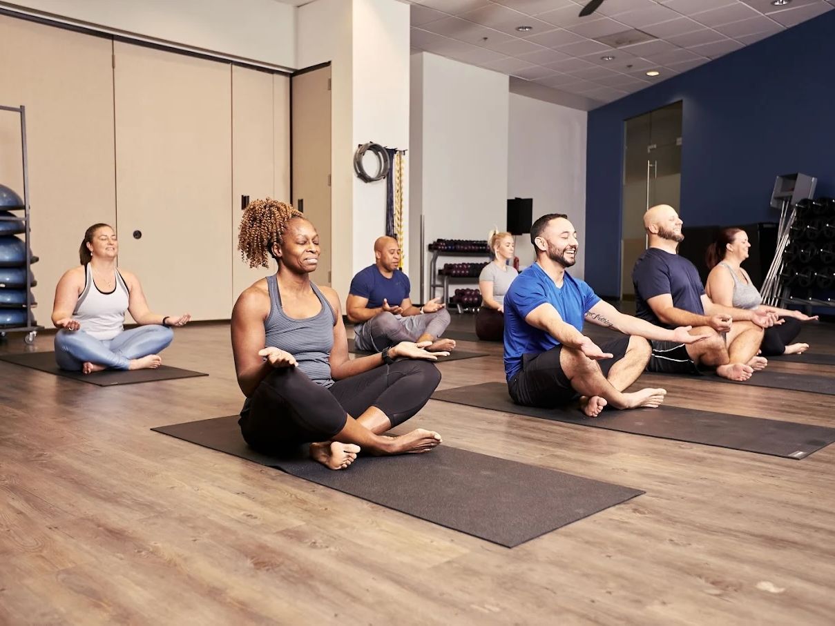 People meditating in a yoga class