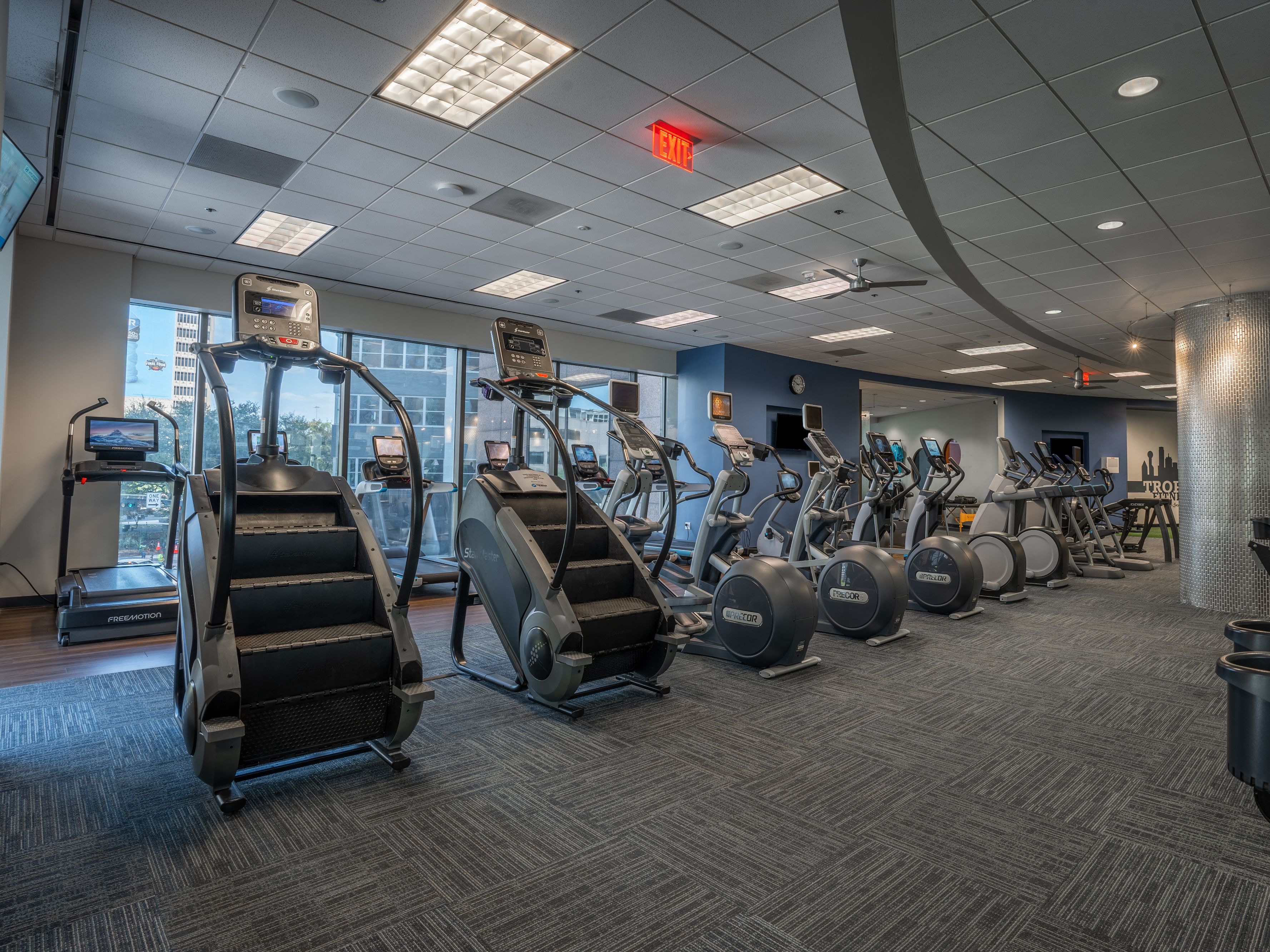 gym with stair master and other cardio equipment