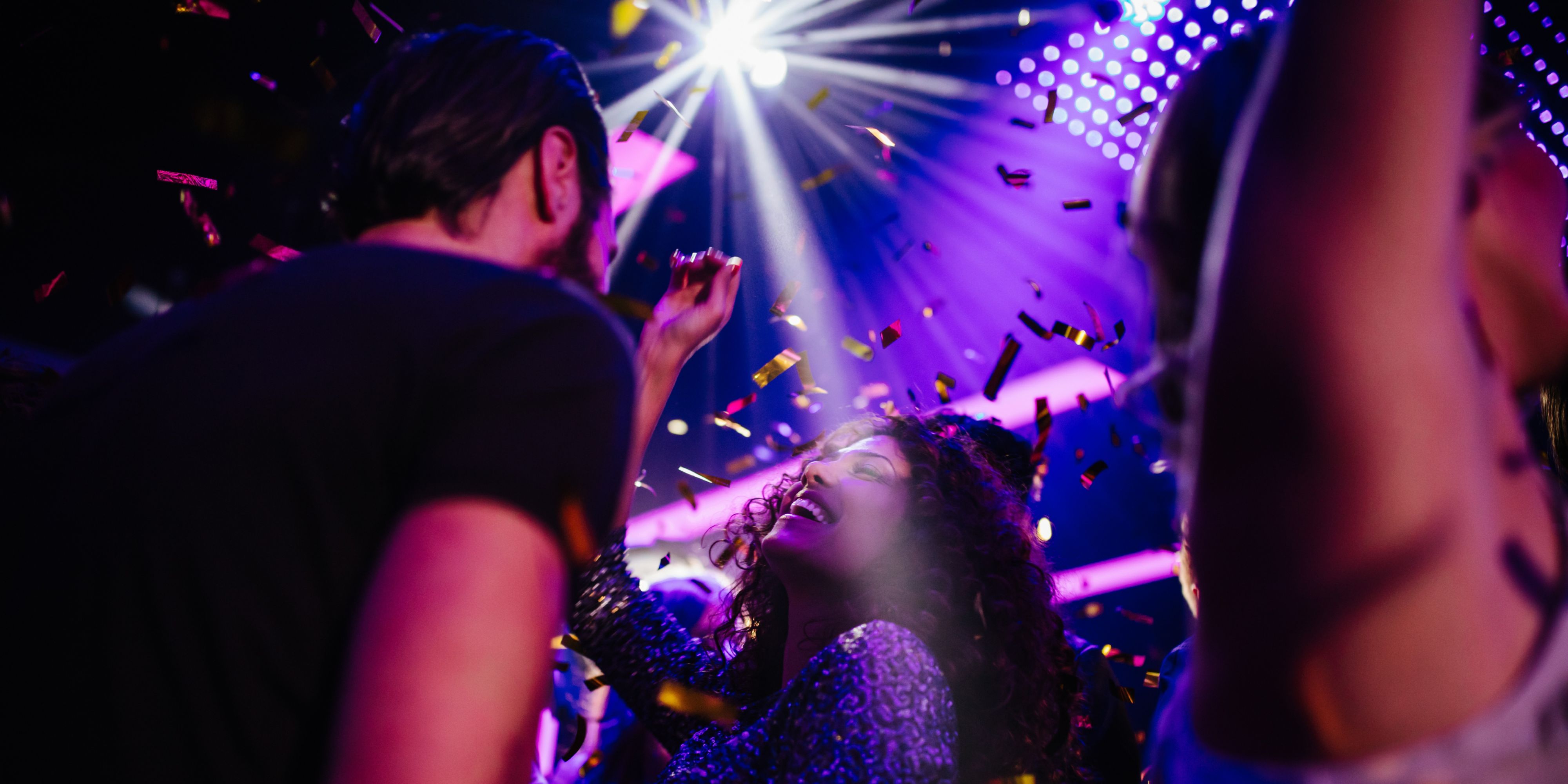 Group of people celebrating and dancing
