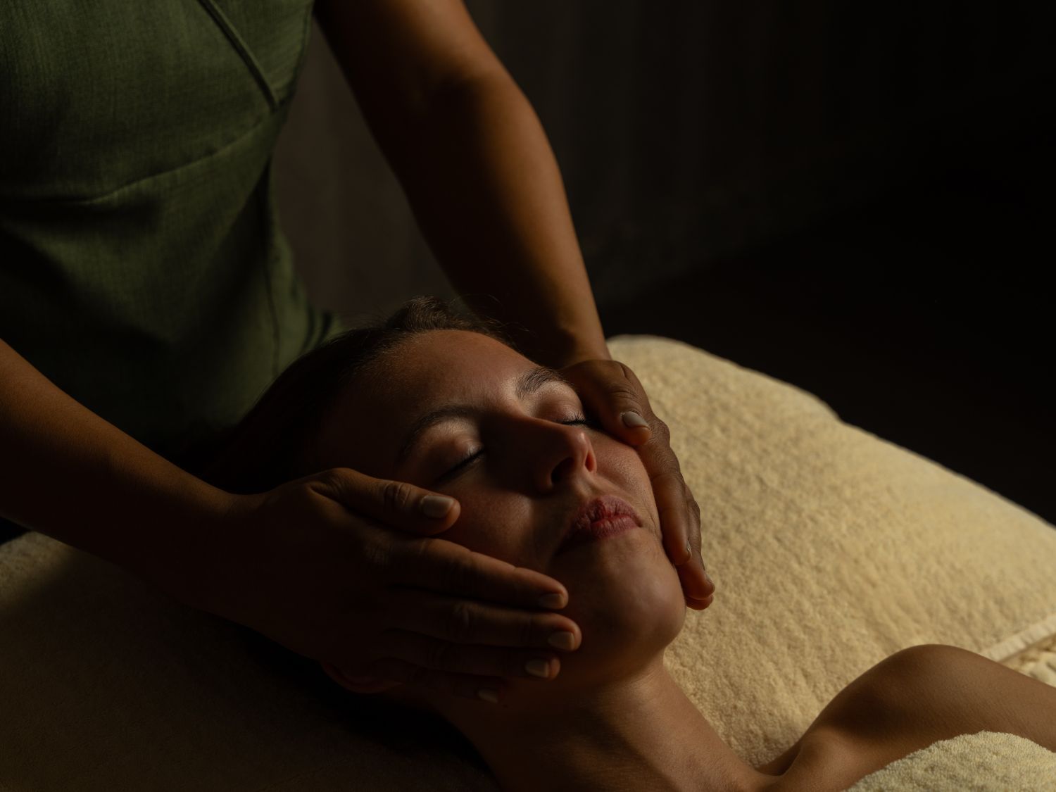 woman receiving a facial