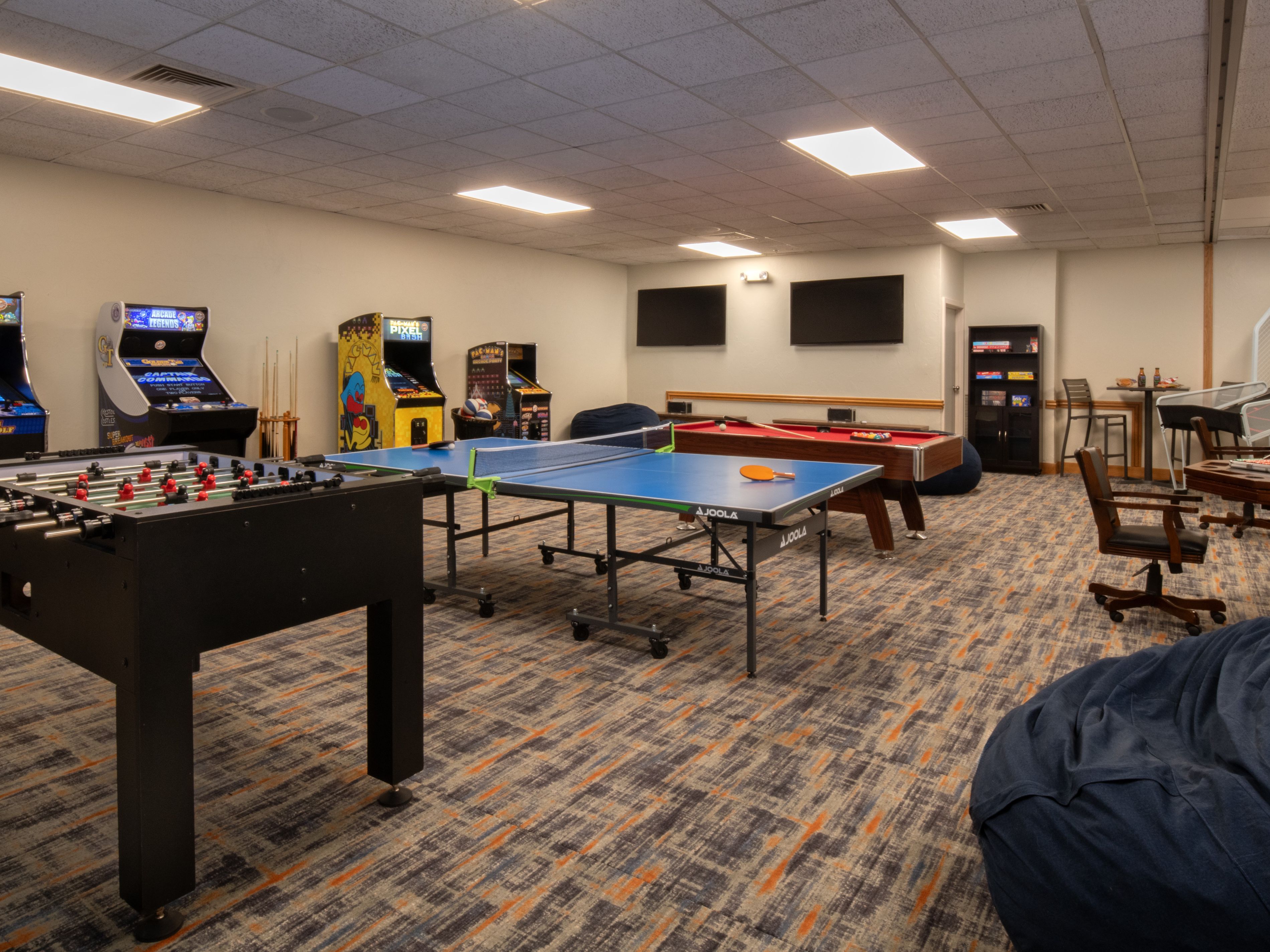 Game room with pingpong table and arcade games