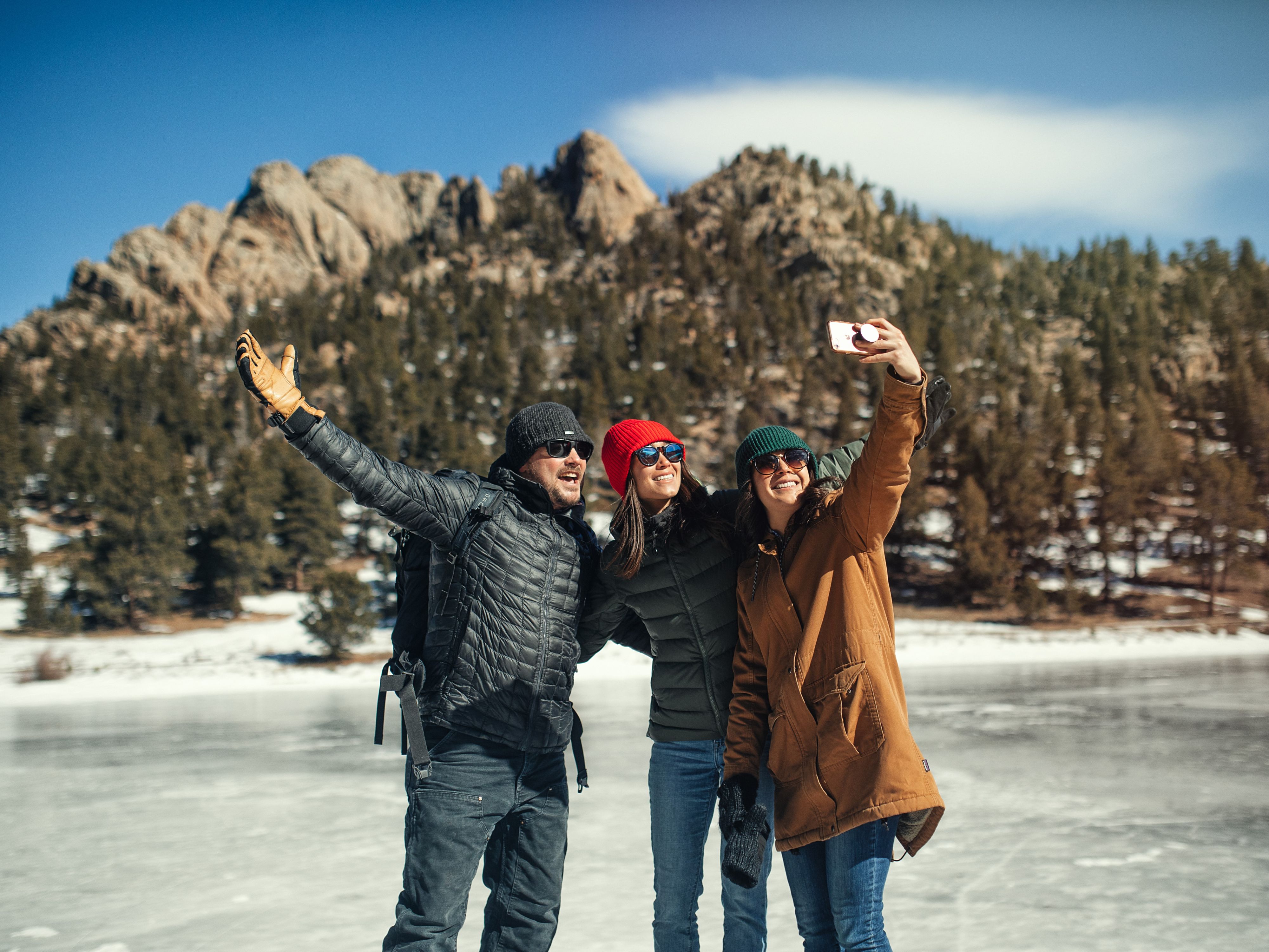 Friends taking a selfie on ice