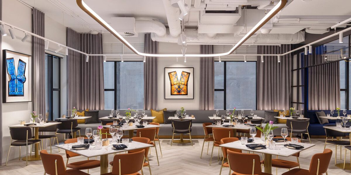 Modern restaurant interior with stylish dining tables.