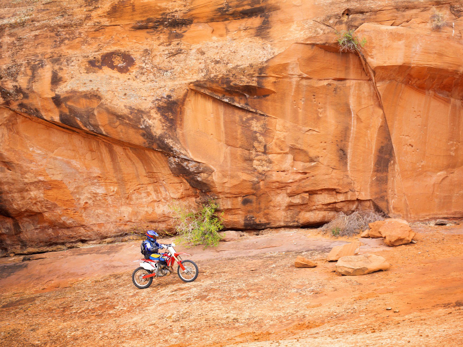 Dirt biking by red rock train