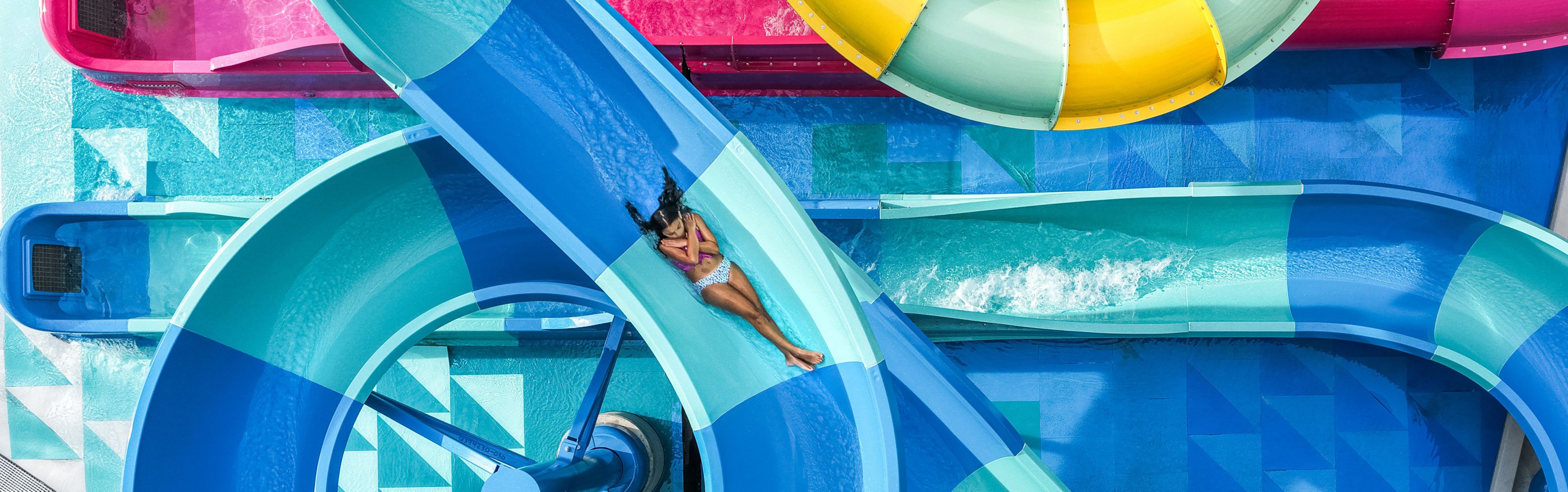 Guest going down a large waterslide