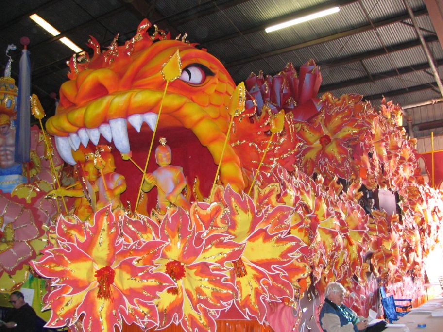 Bride and bridesmaids posing on a bed