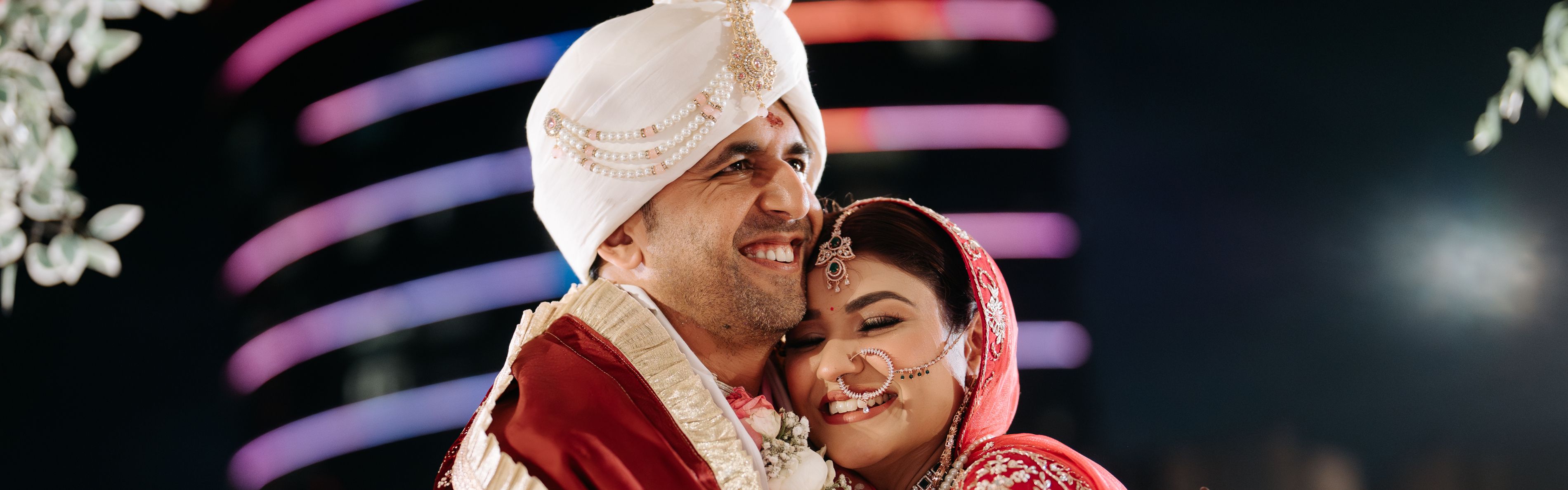 Happy couple hugging after wedding. 