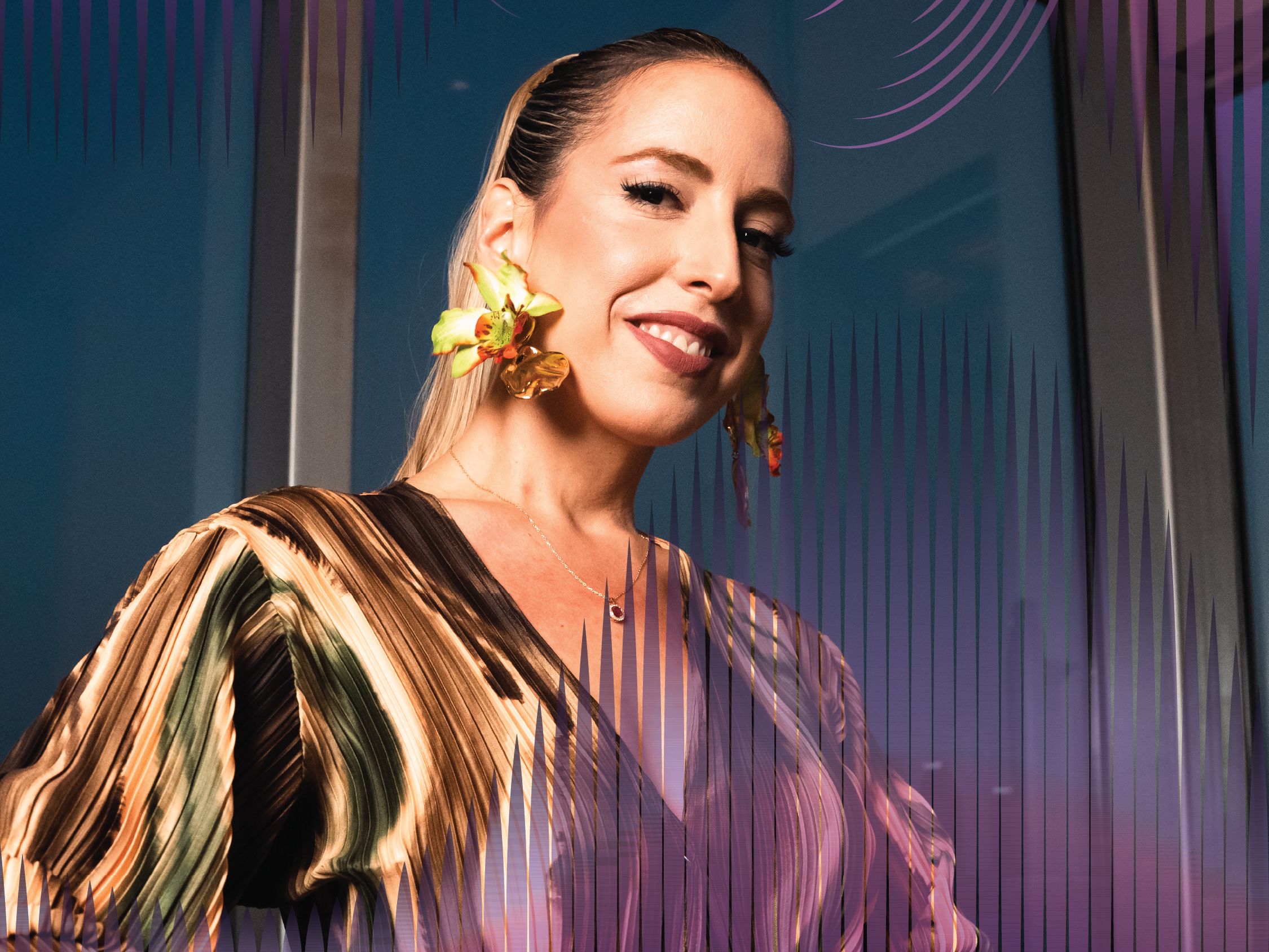 Performer Nina smiling at the camera.