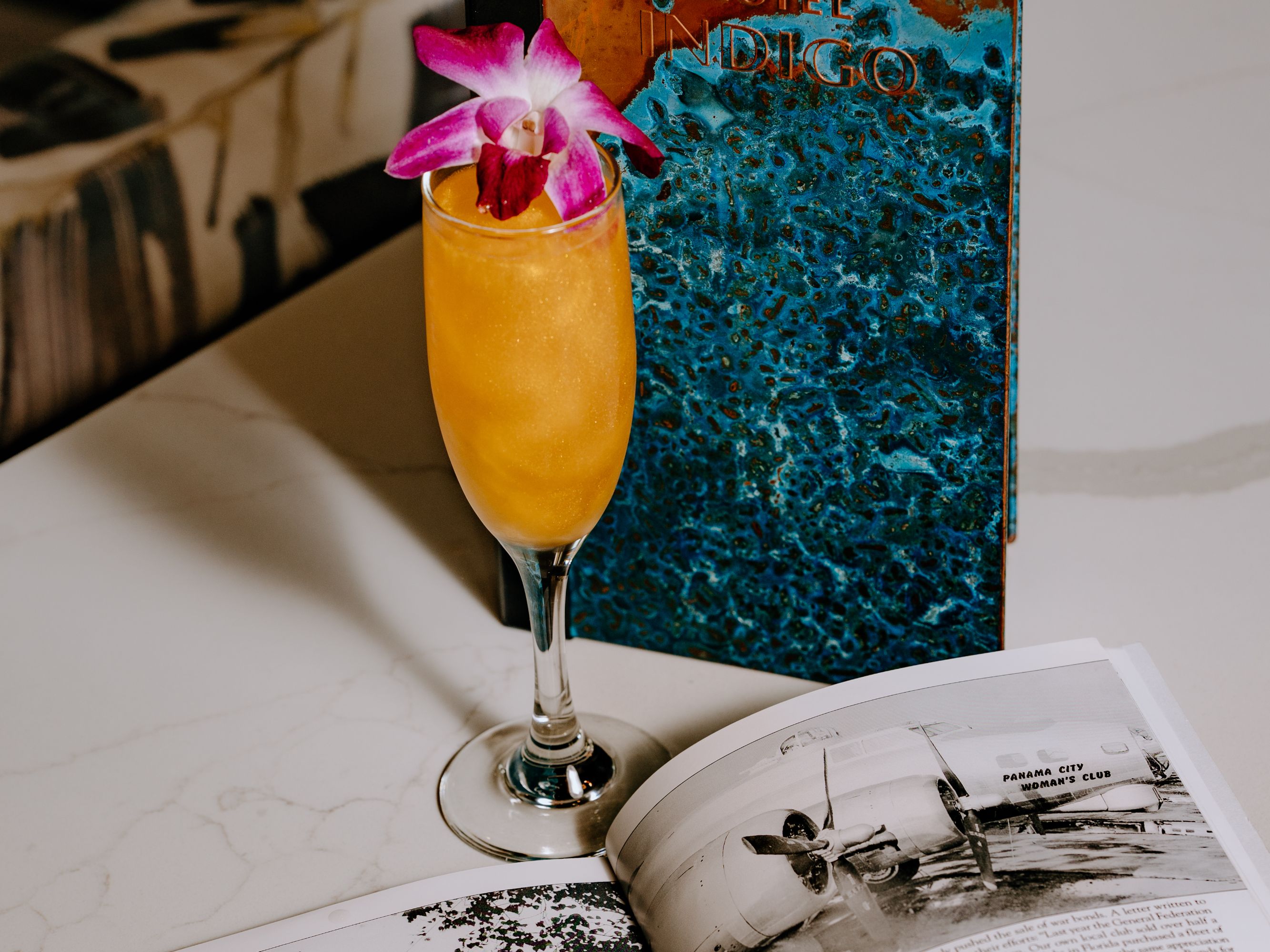 Cocktail styled with a flower.