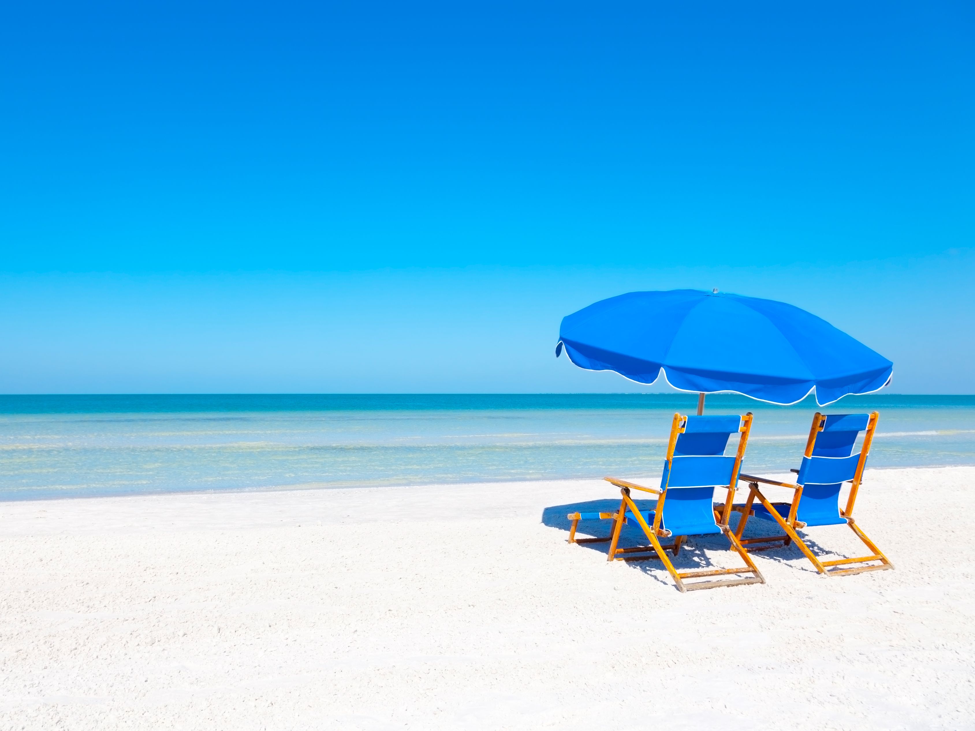 beach chairs by the ocean