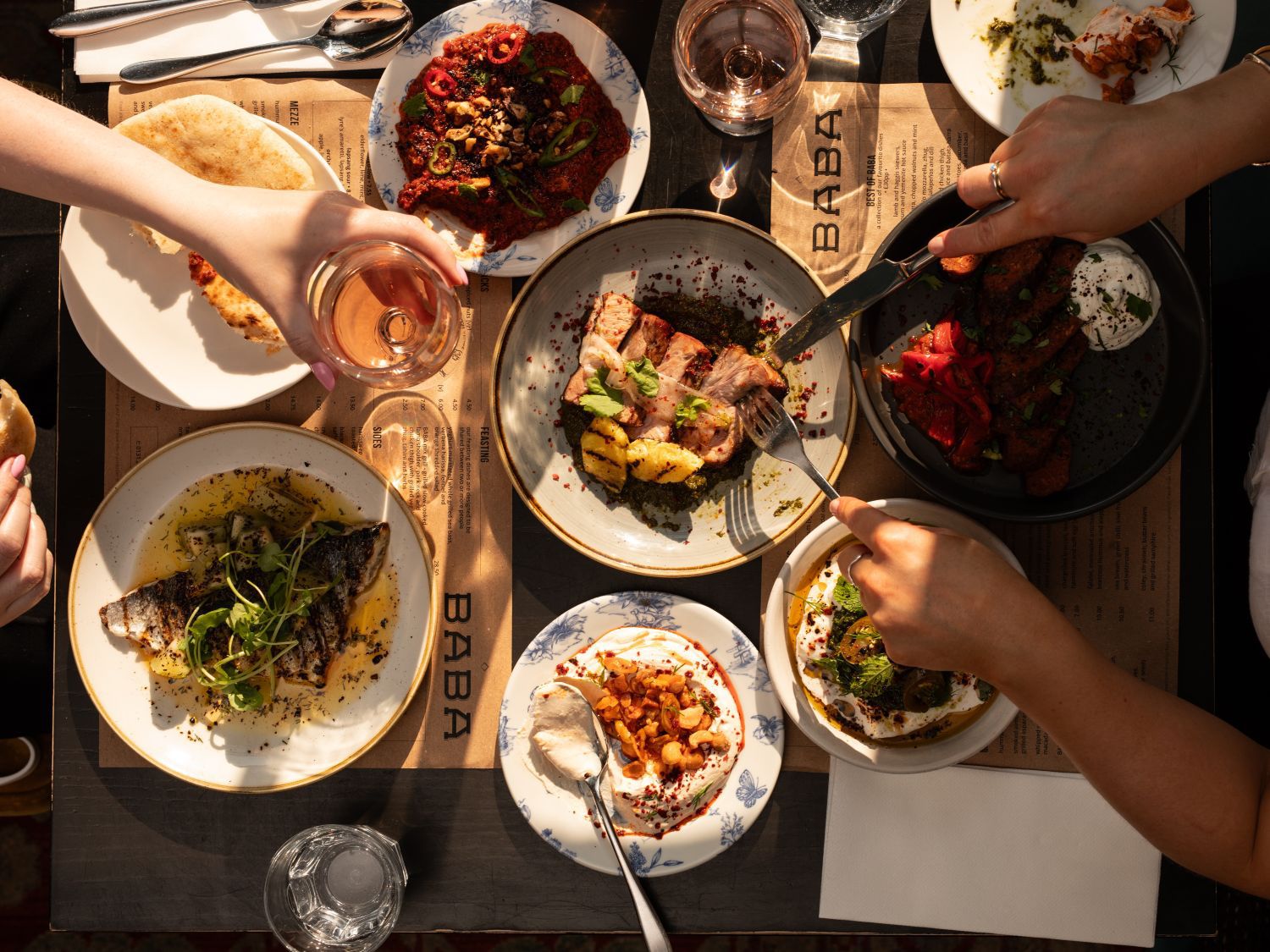 Baba Dining Table with various delicious plates