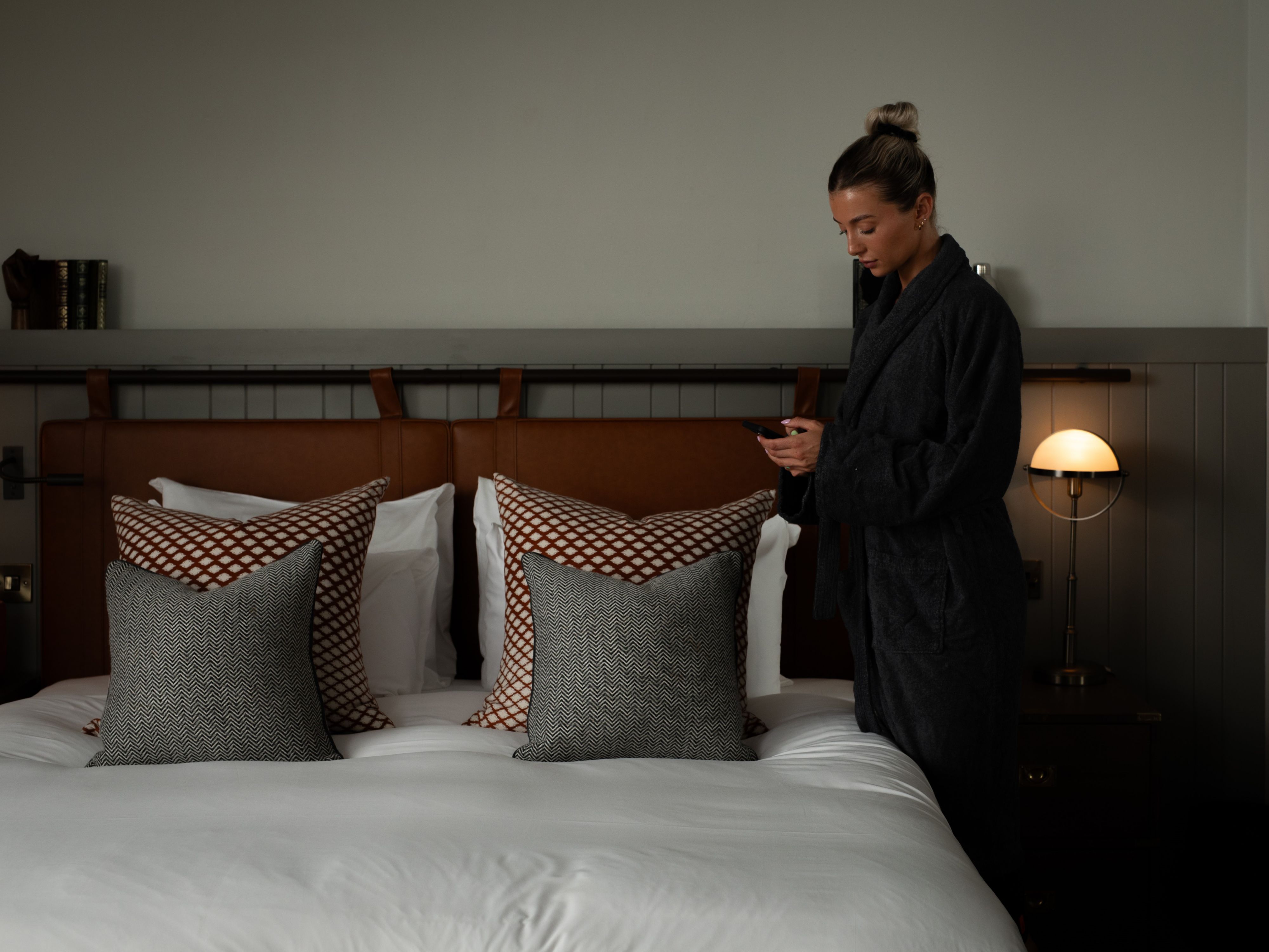 Robed woman in her room