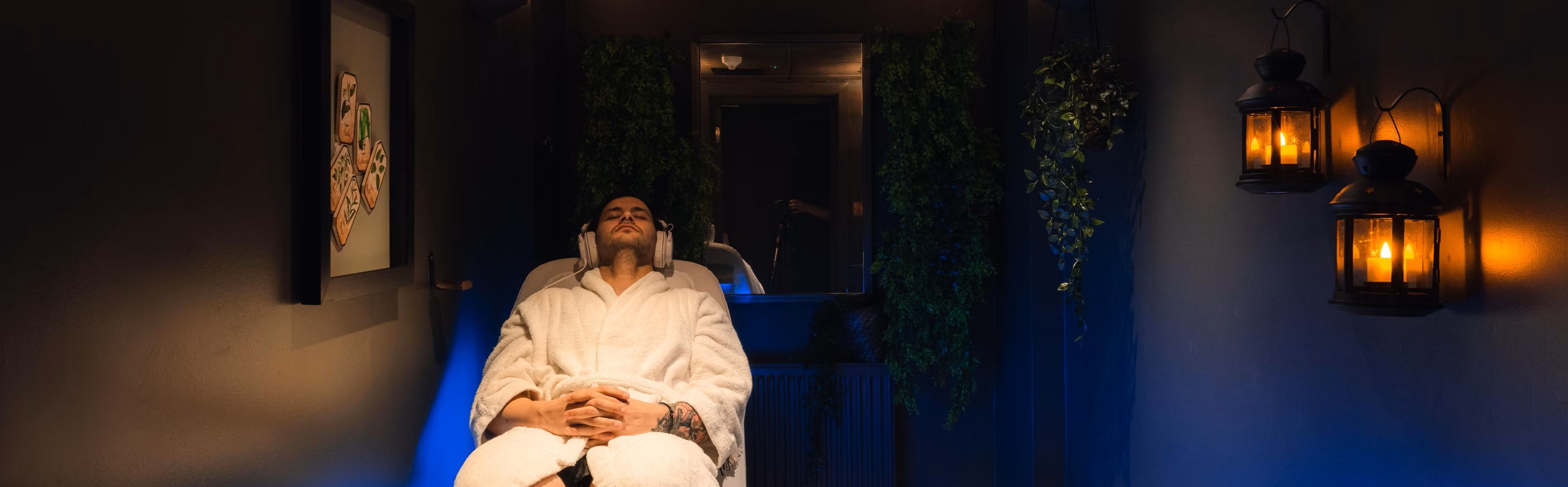 Man laying down with headphones on