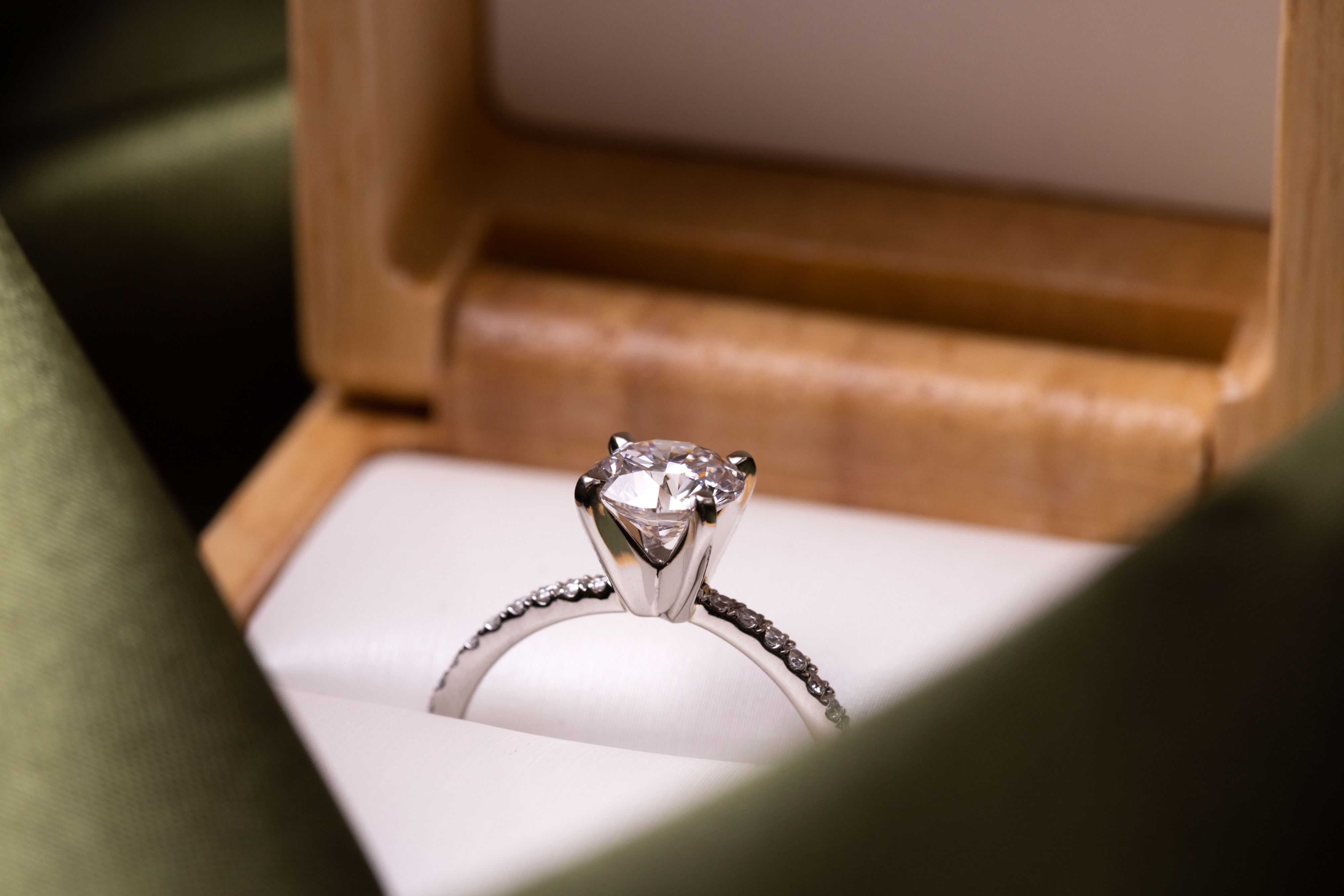 Diamond engagement ring in a ring box.