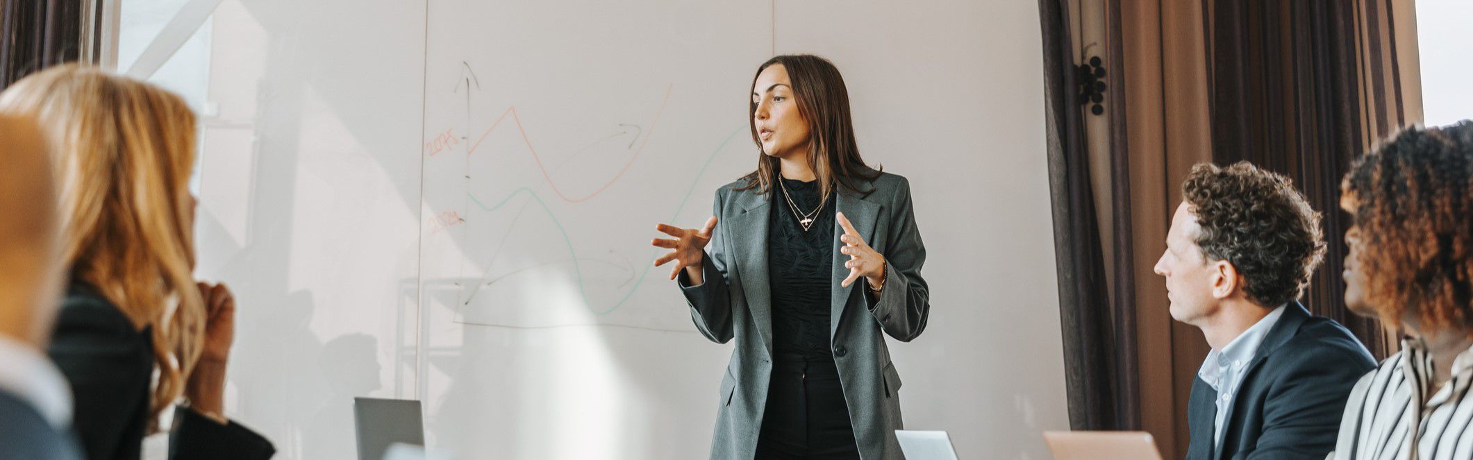 Female colleague leading a meeting