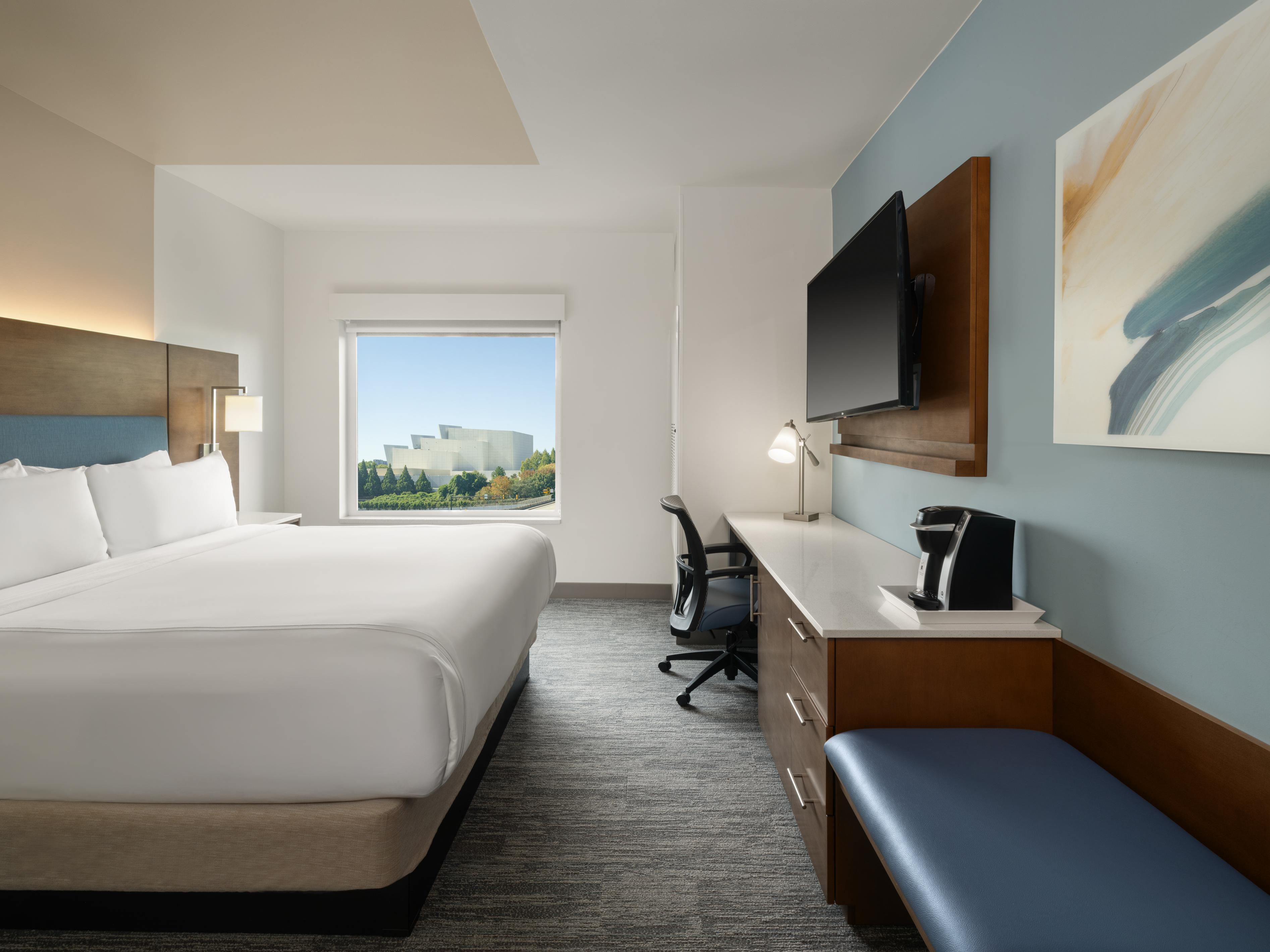 King Bed Guest Room with spacious workstation for your stay.