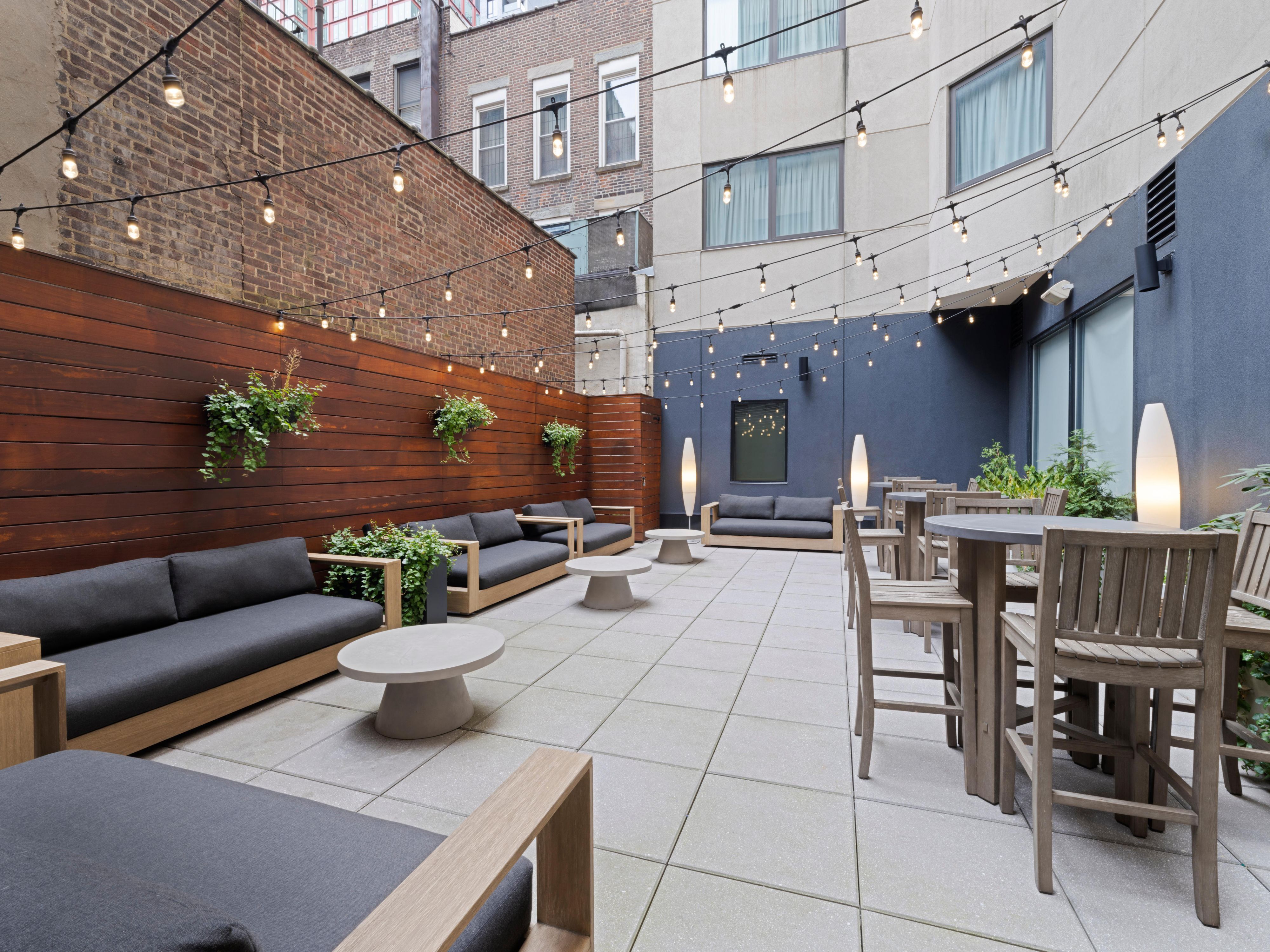 Outdoor patio space with seating.