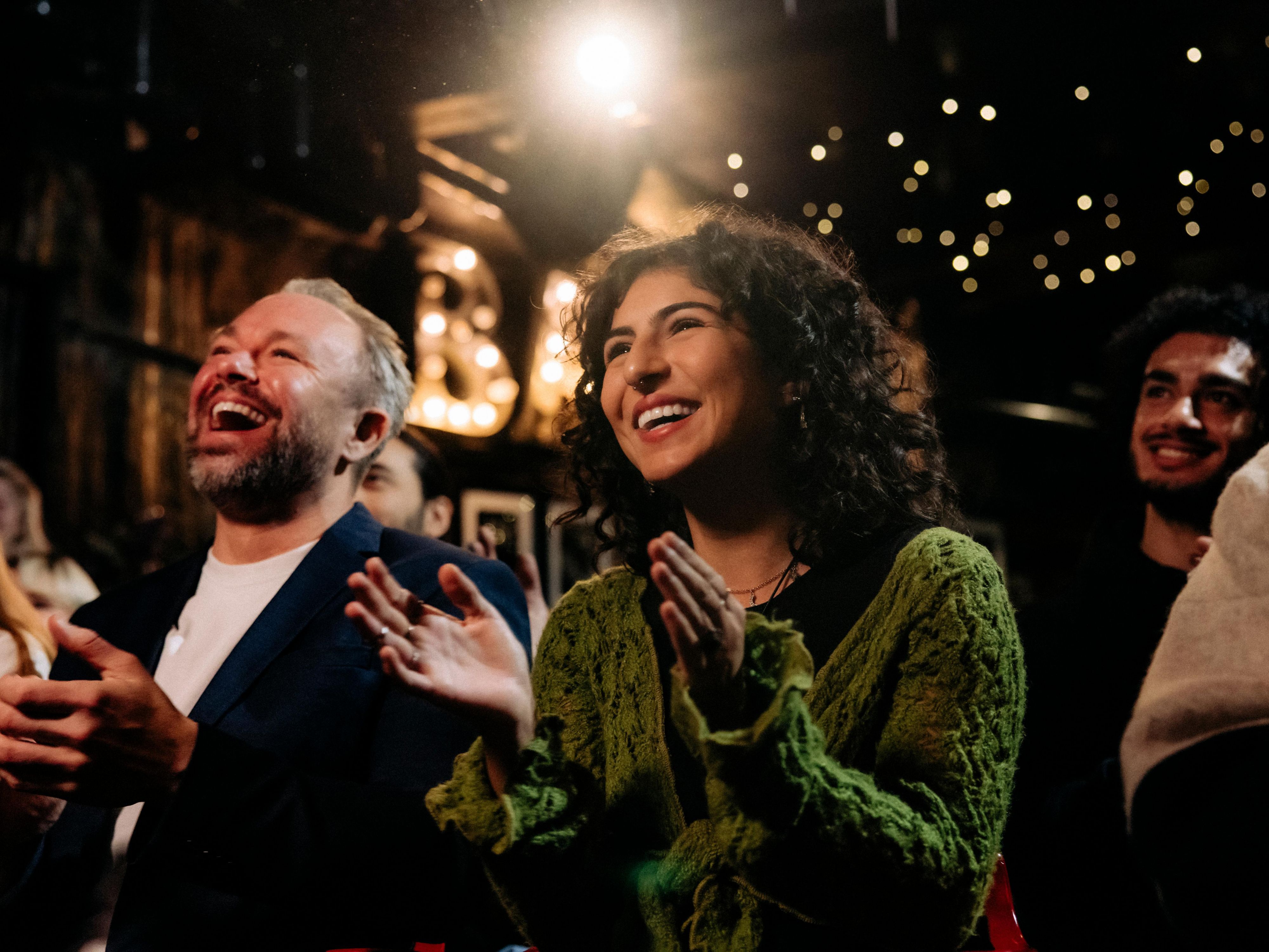 A couple enjoying a show