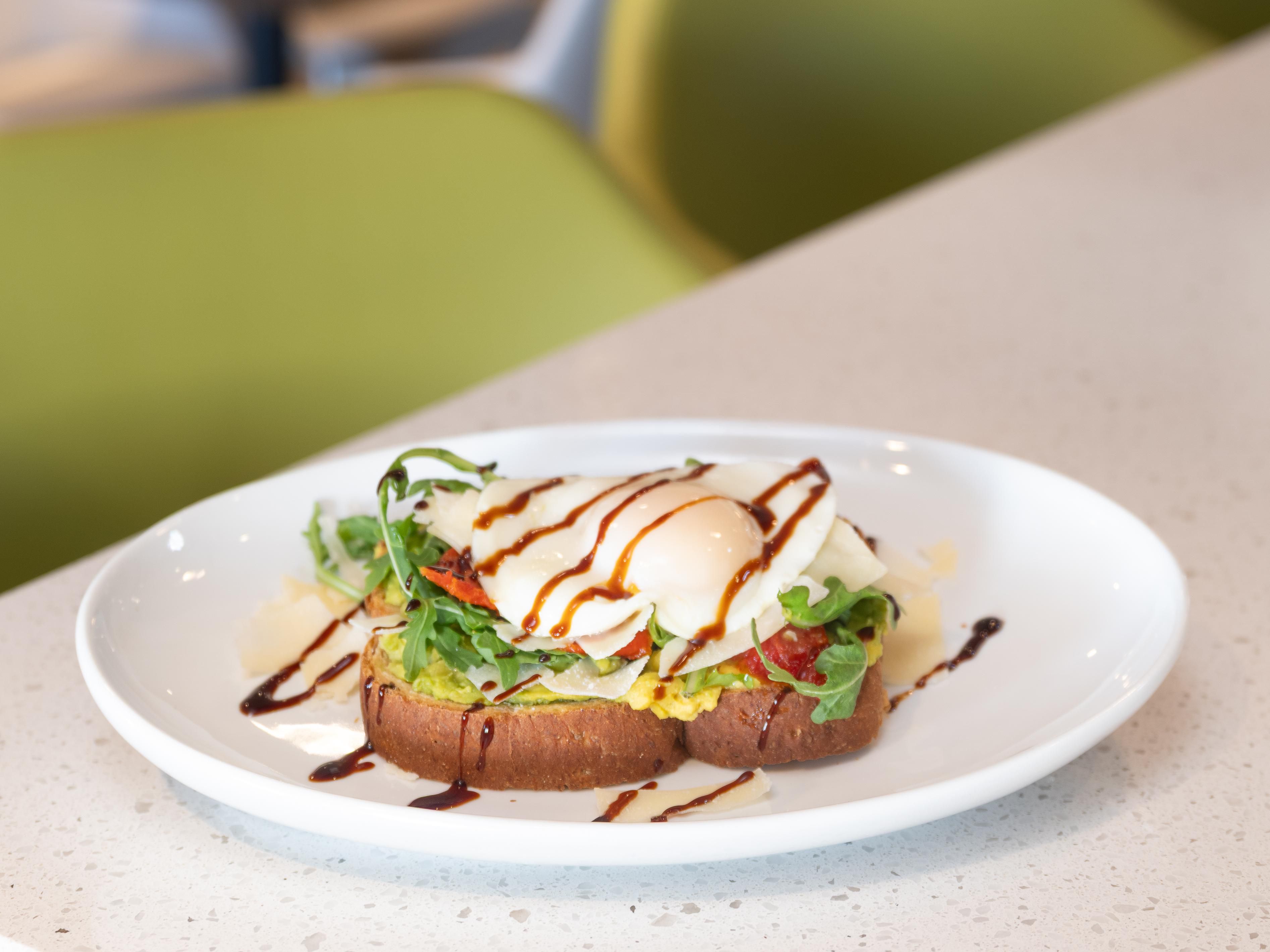 Welcome to EVEN Kitchen & Bar! Our menu is filled with fresh and flavorful options that cater to all tastes. Start your day with a hearty breakfast or enjoy a satisfying dinner. Our bar has a selection of craft beers, fine wines, signature cocktails, and delicious bites. 