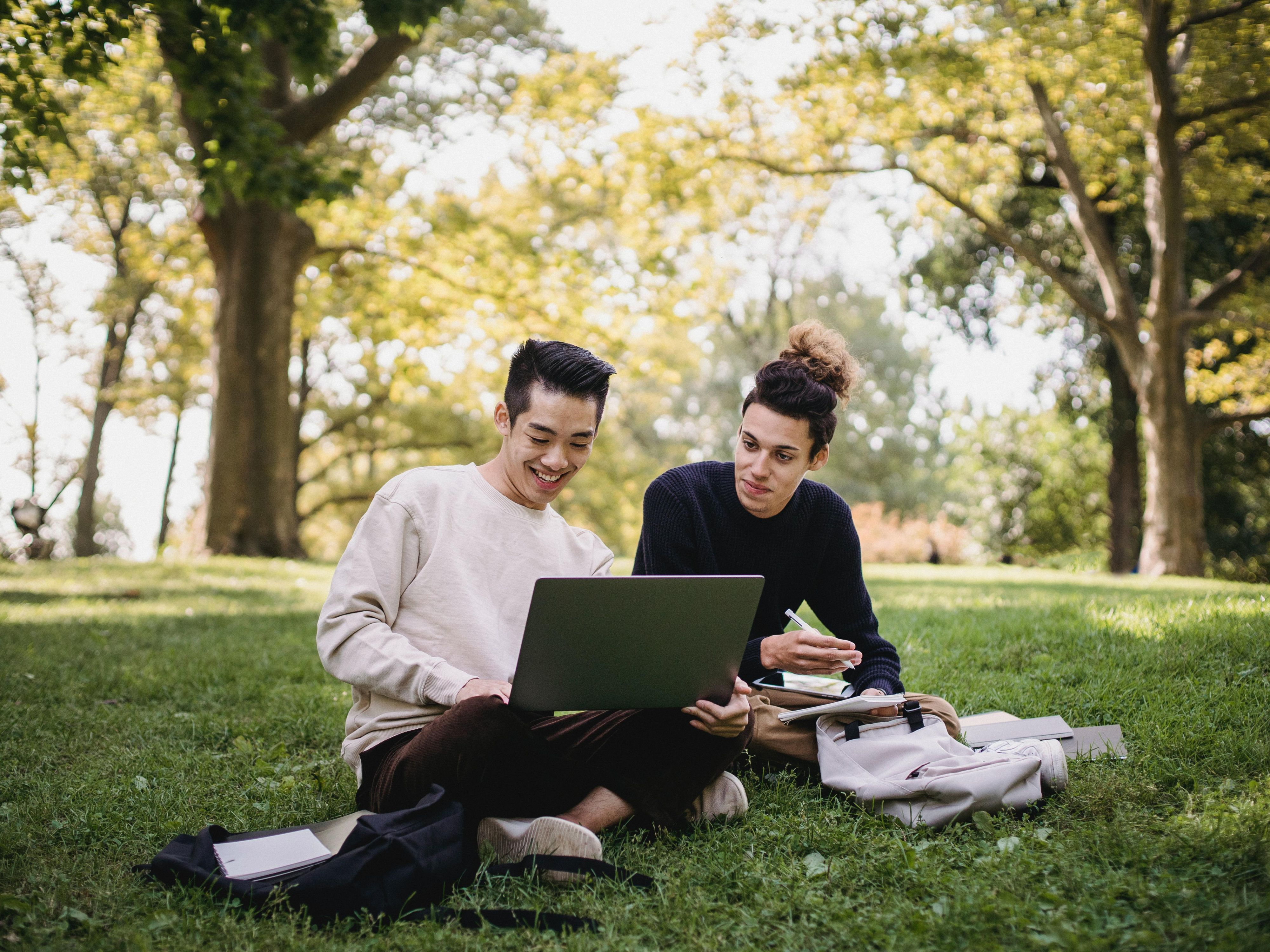students sitting on campus