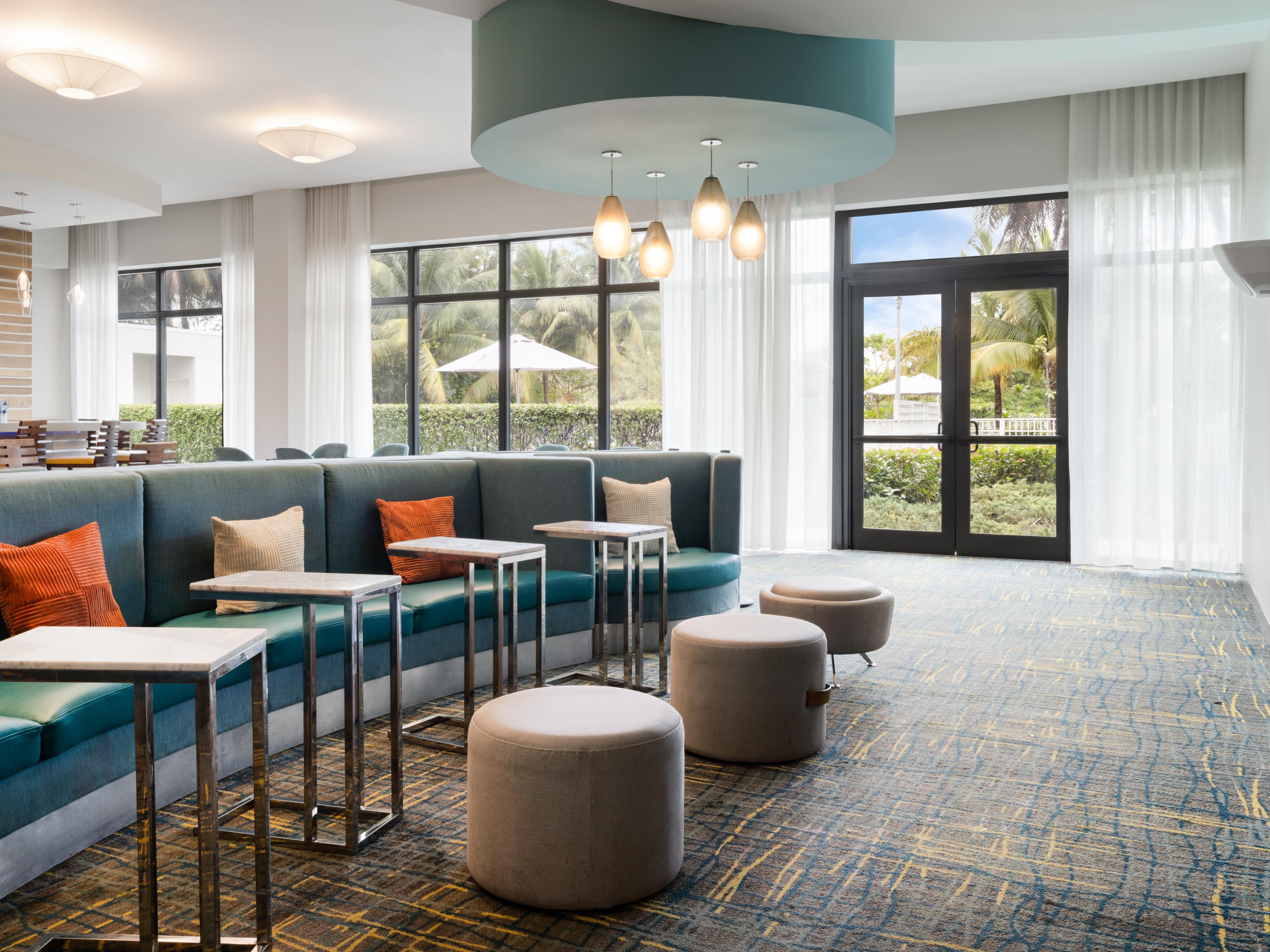 Relax and recharge in our comfy lobby seating.
